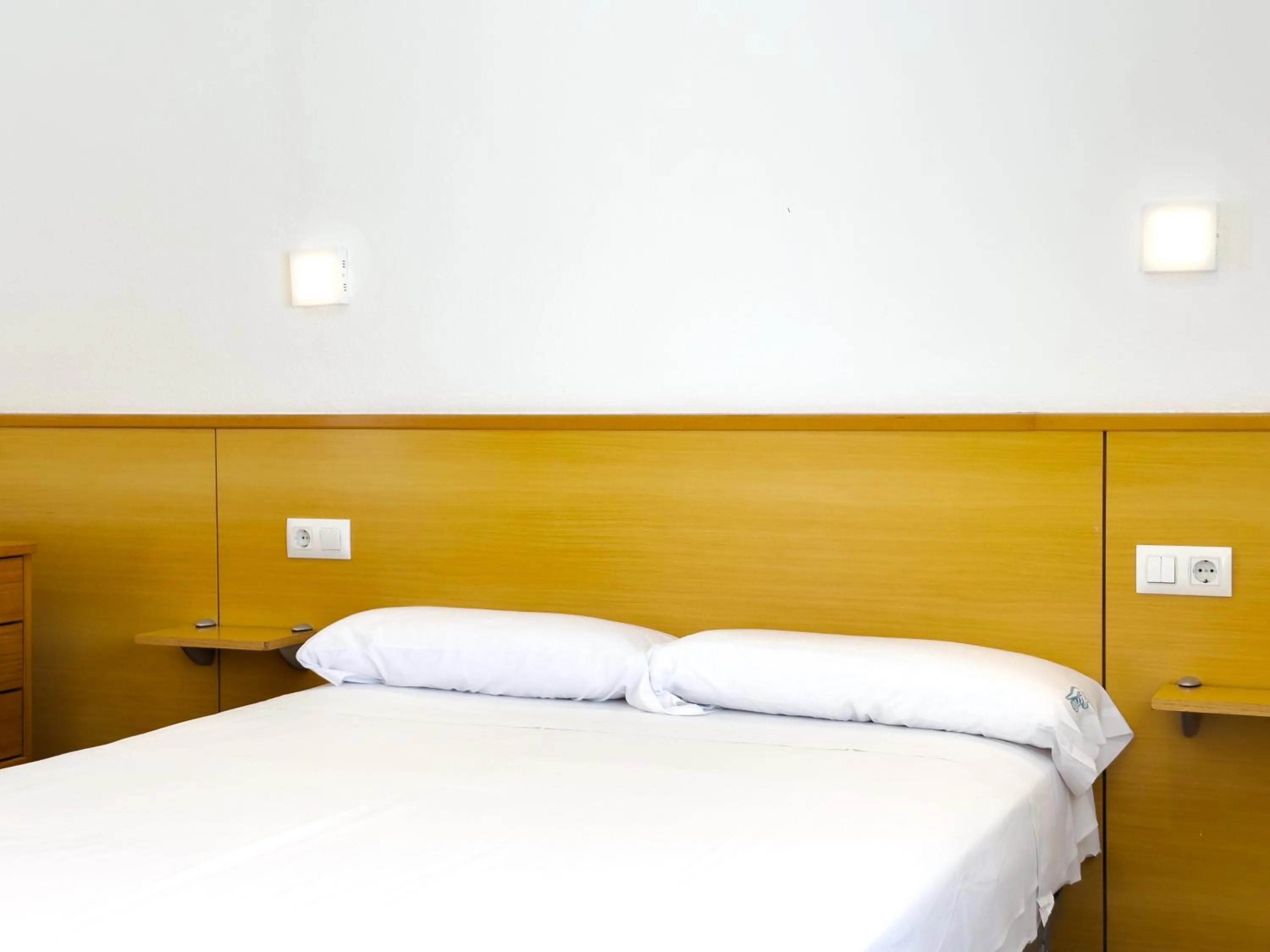 Bed in Rentalmar Atlantida Atico