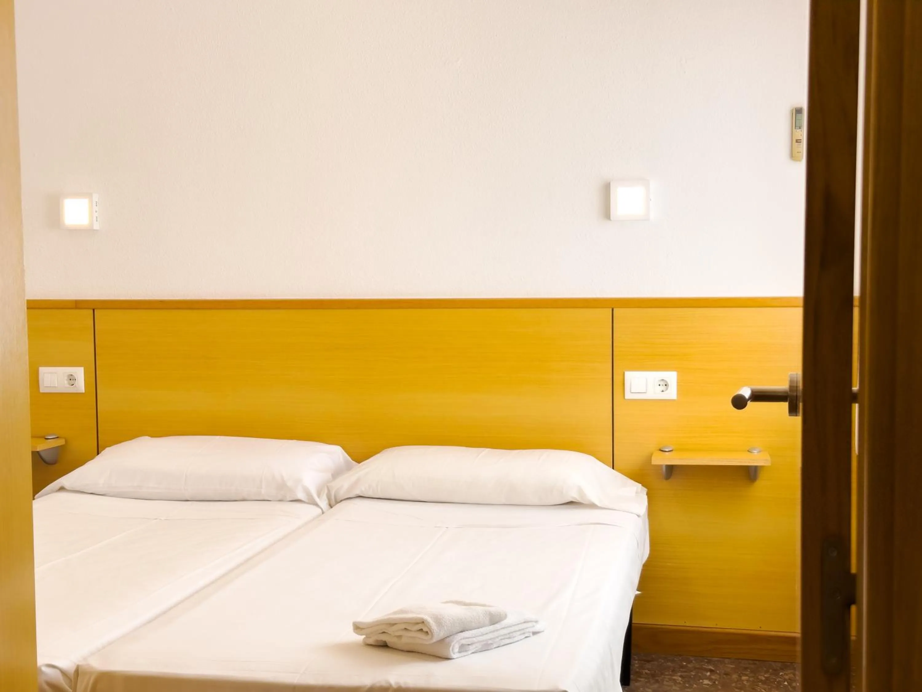 Bed in Rentalmar Atlantida Atico