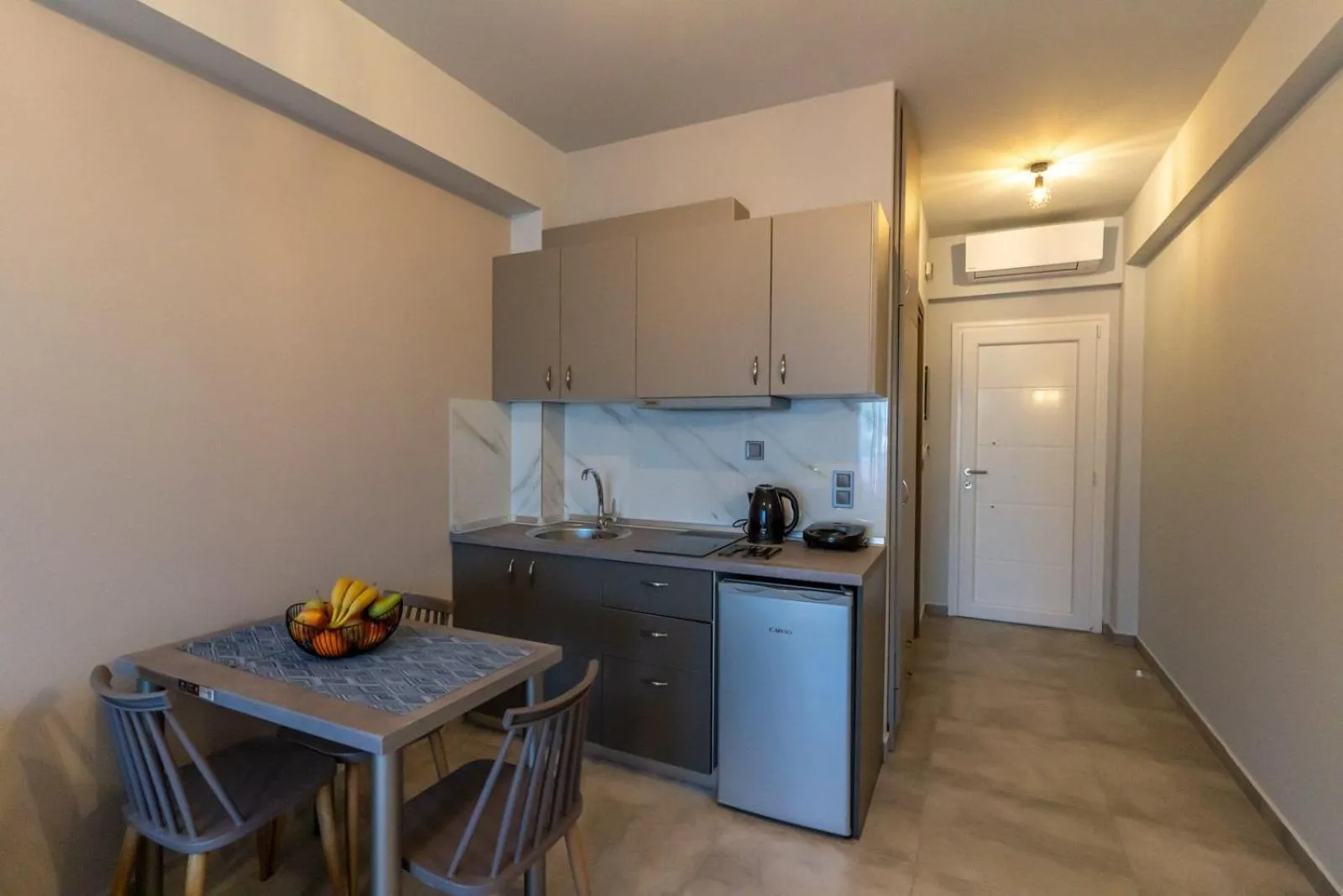 Kitchen or kitchenette in AURA APARTMENTS