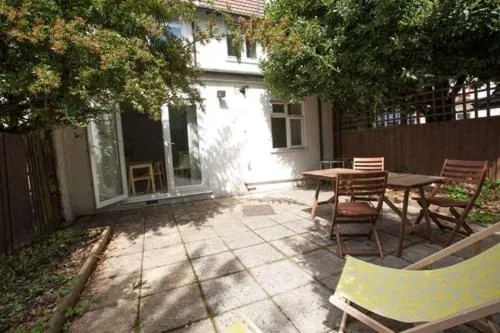 Patio in Tooting Rooms & Studio by PrimeCityHosts