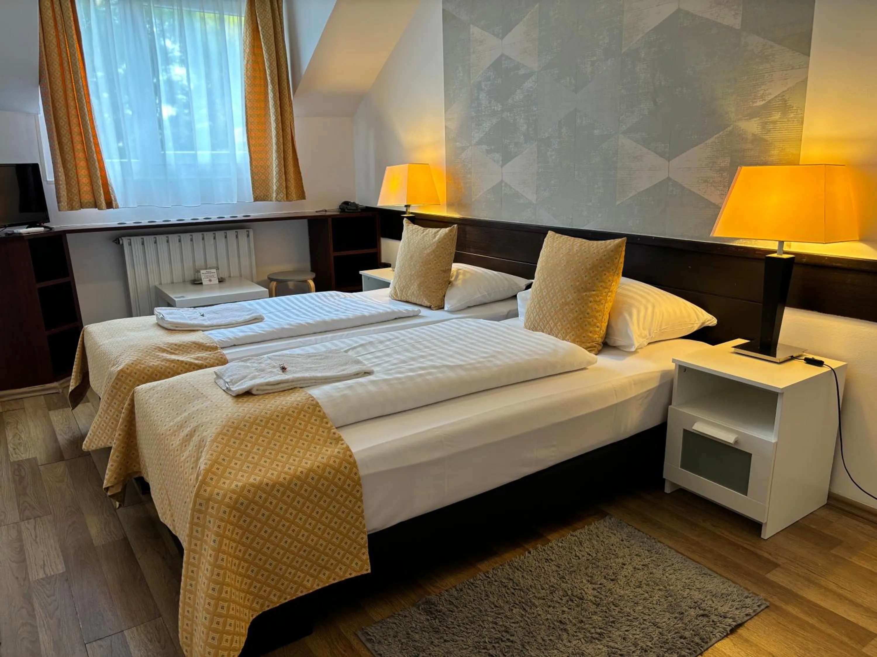 Bed in Hotel Gloria Budapest City Center