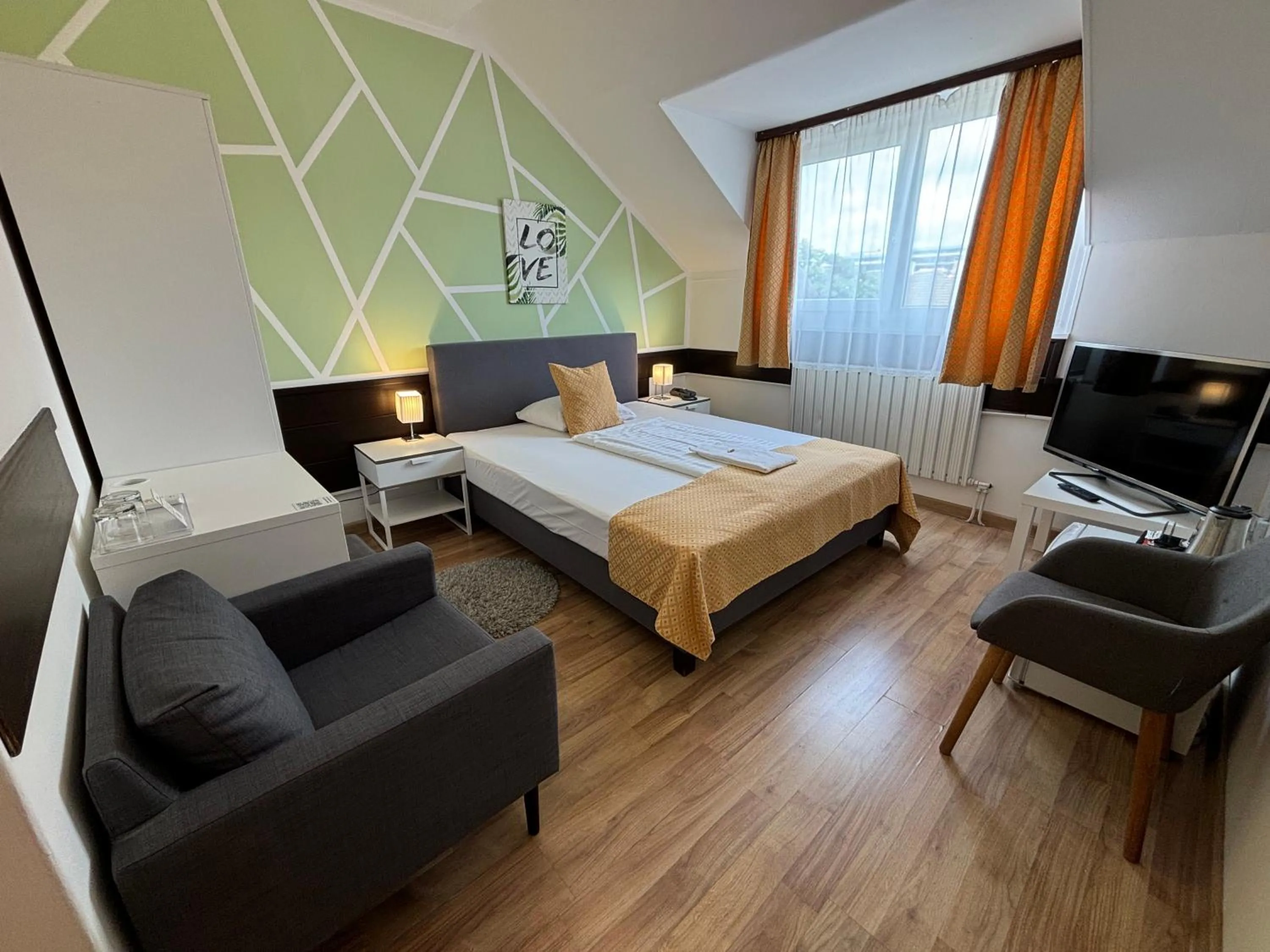 Bed in Hotel Gloria Budapest City Center