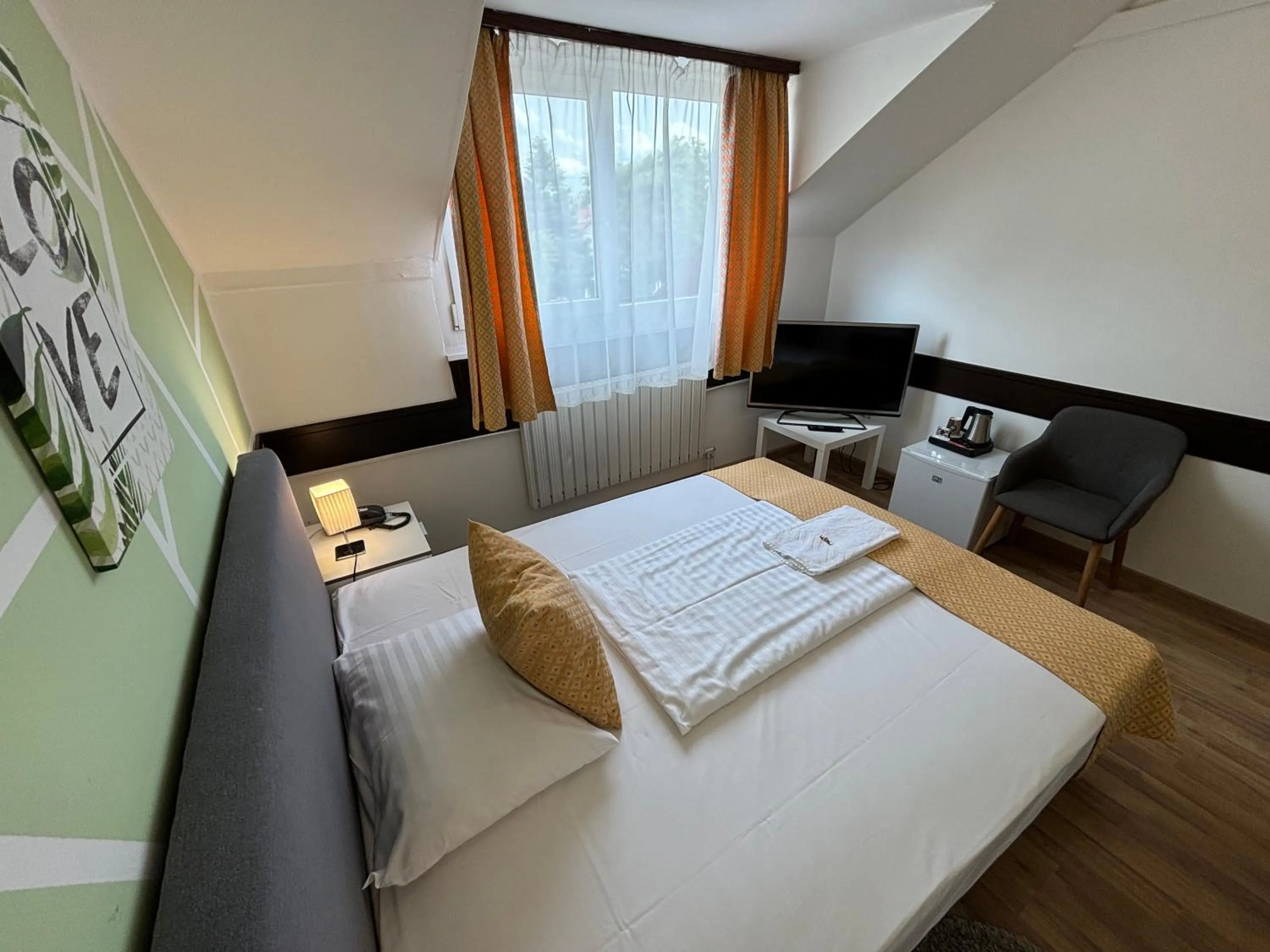 Bed in Hotel Gloria Budapest City Center