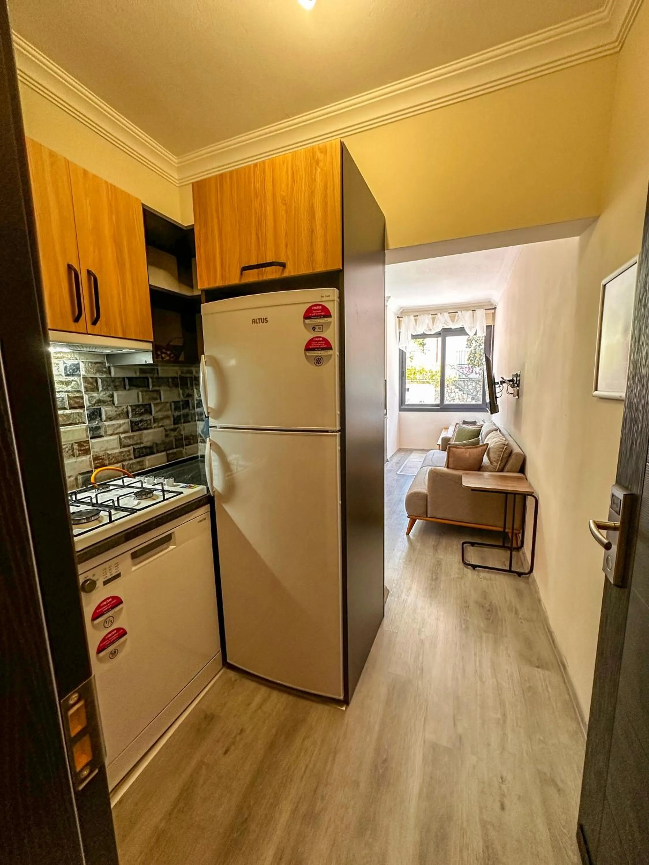 Kitchen or kitchenette in Mykonut Boutique Suites