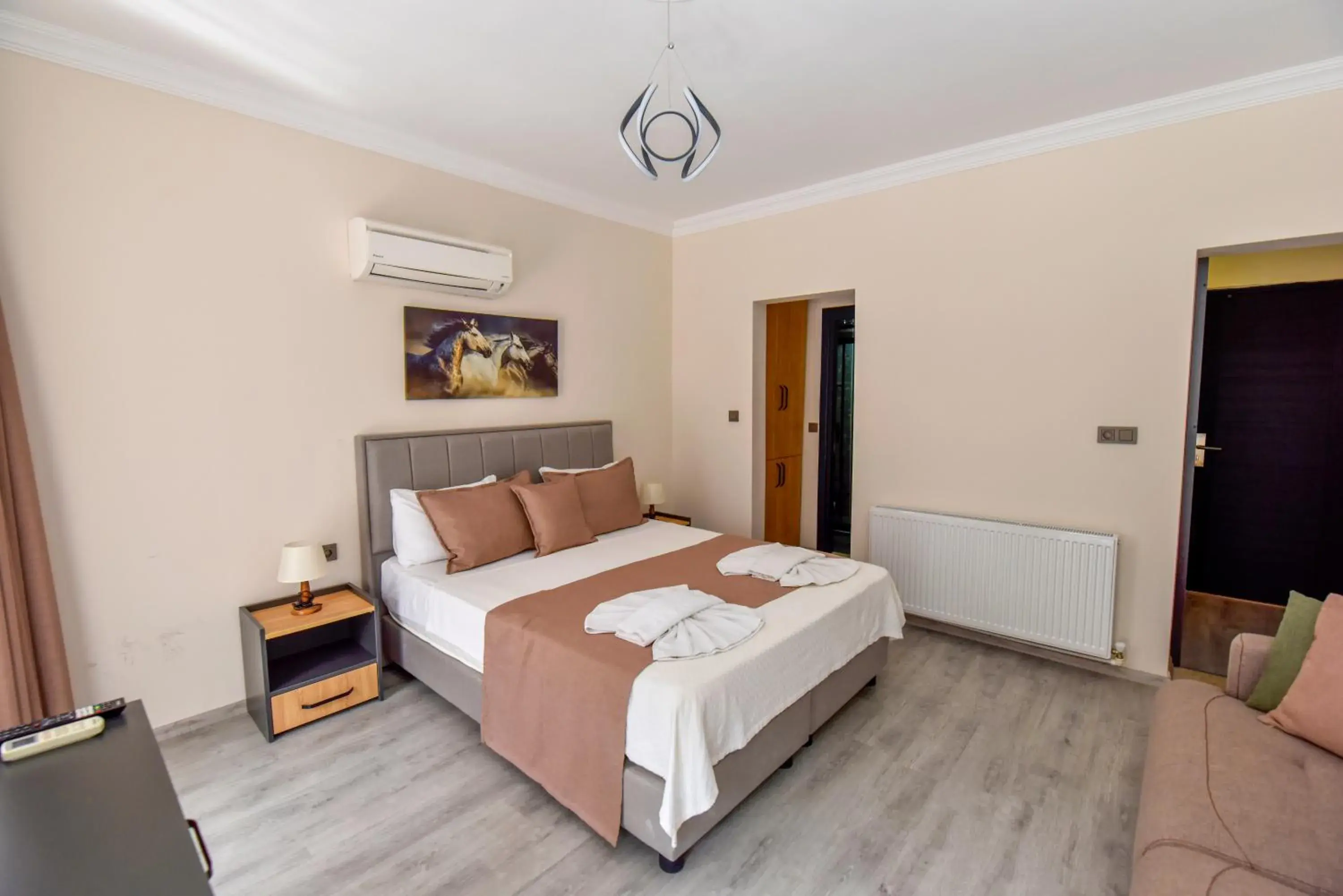 Triple Room with Mountain View in Mykonut Boutique Suites Triple Room with Mountain View in Mykonut Boutique Suites