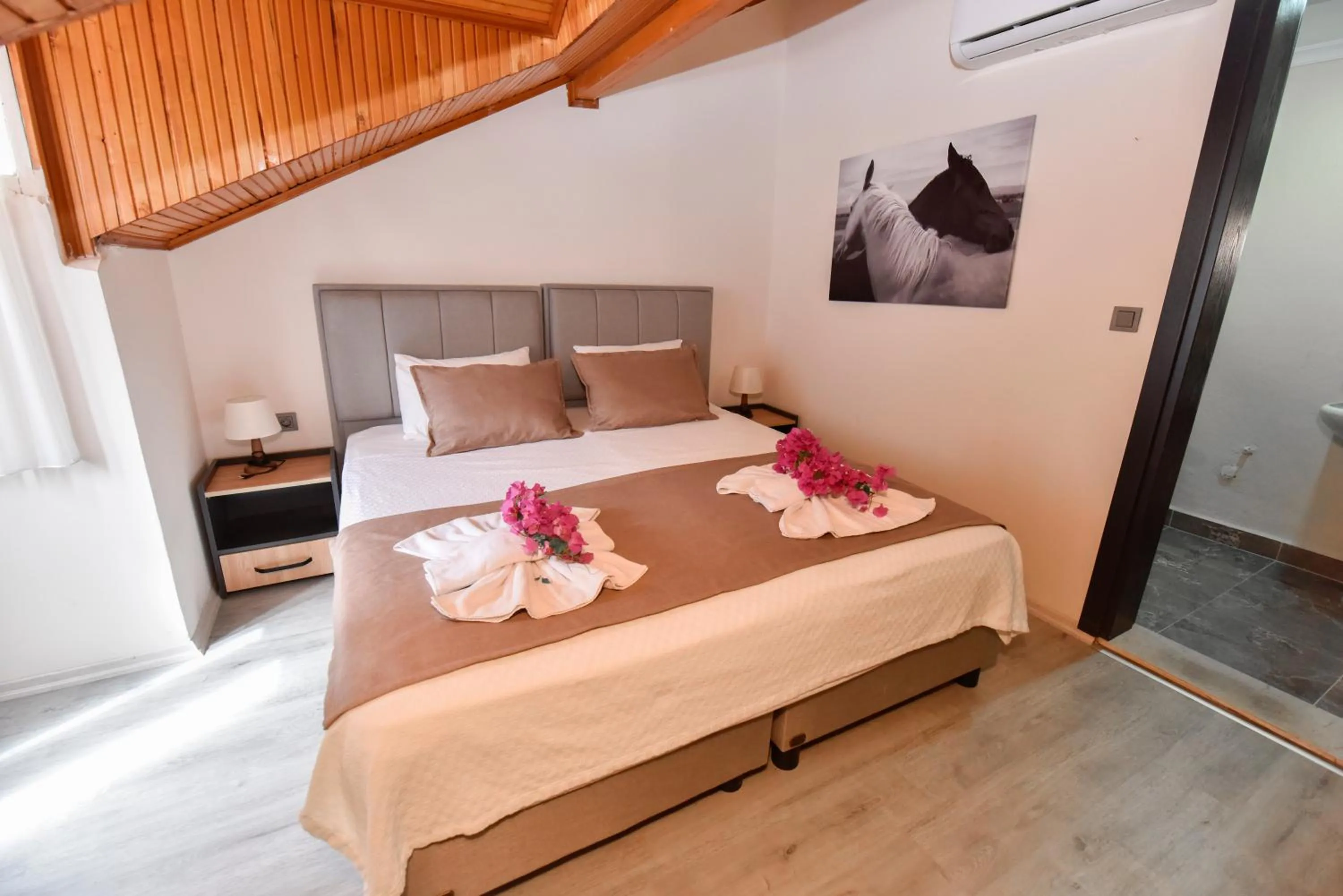 Bed in Mykonut Boutique Suites