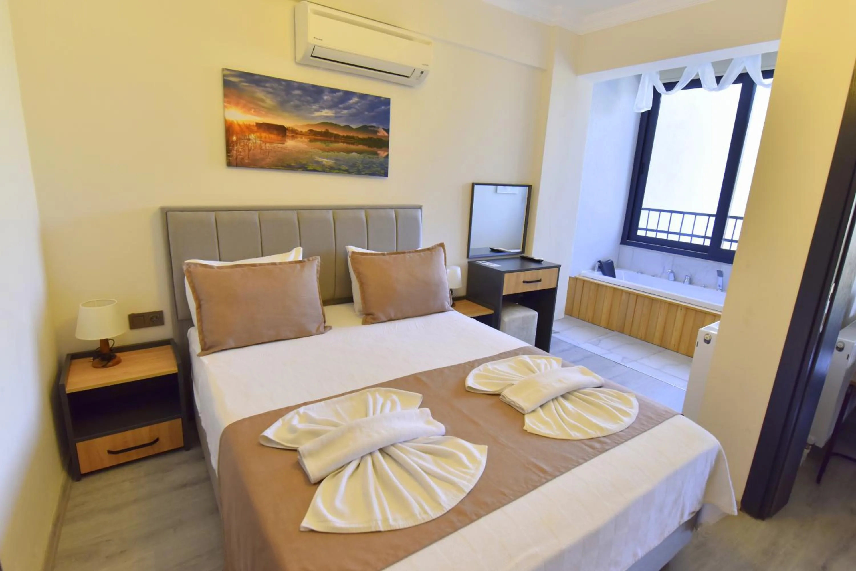 Bed in Mykonut Boutique Suites