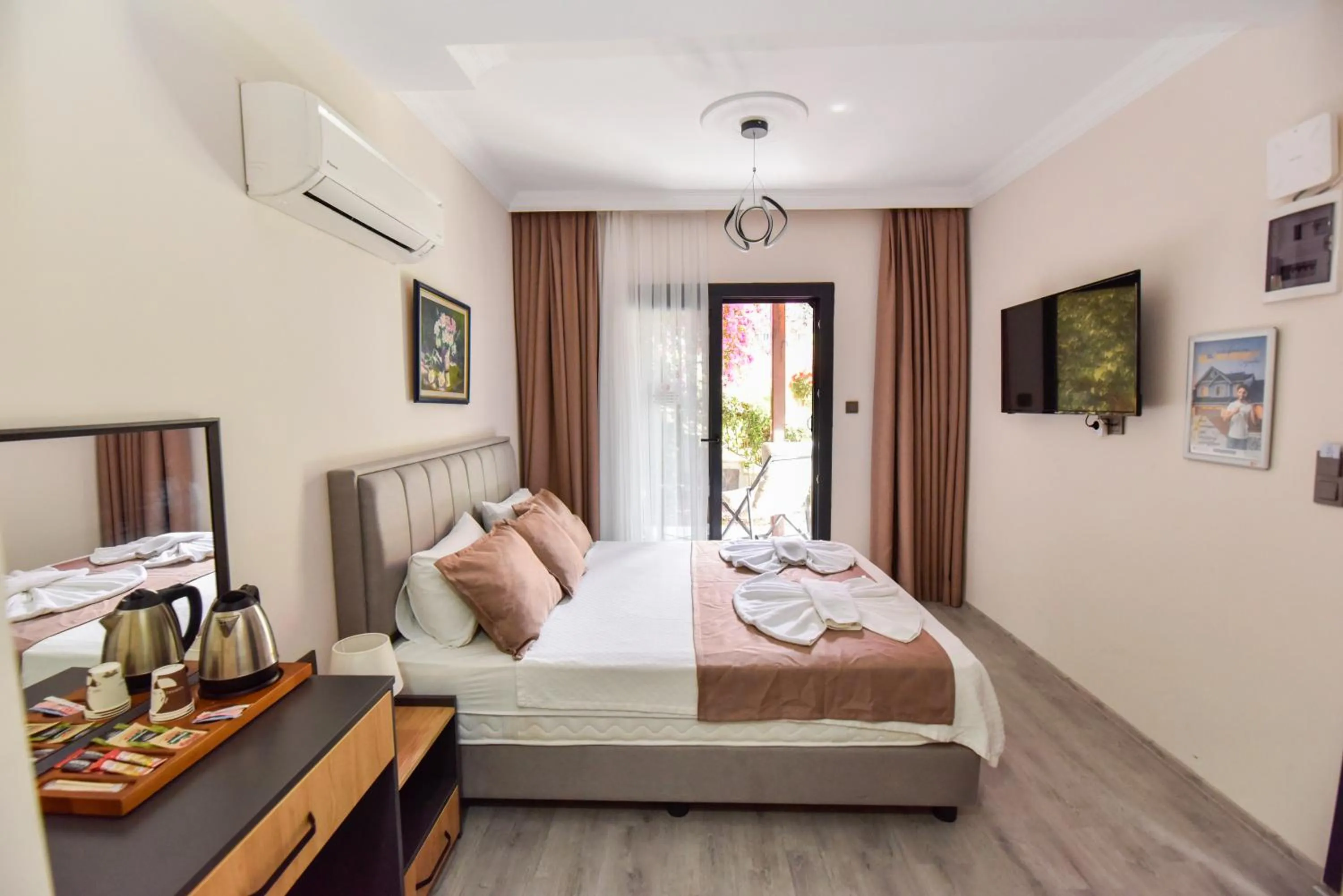 Bed in Mykonut Boutique Suites