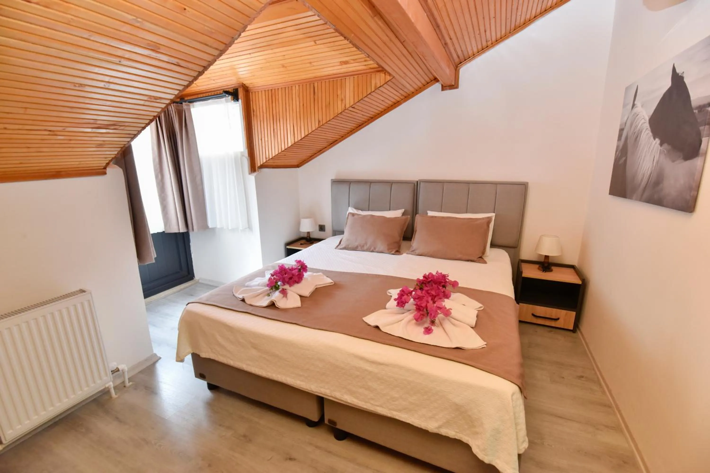 Bed in Mykonut Boutique Suites