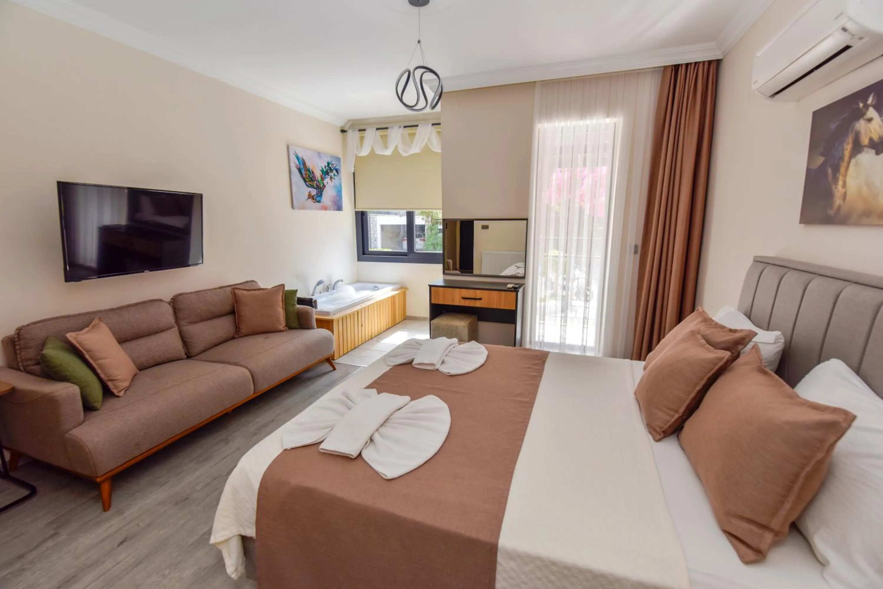 Bed in Mykonut Boutique Suites