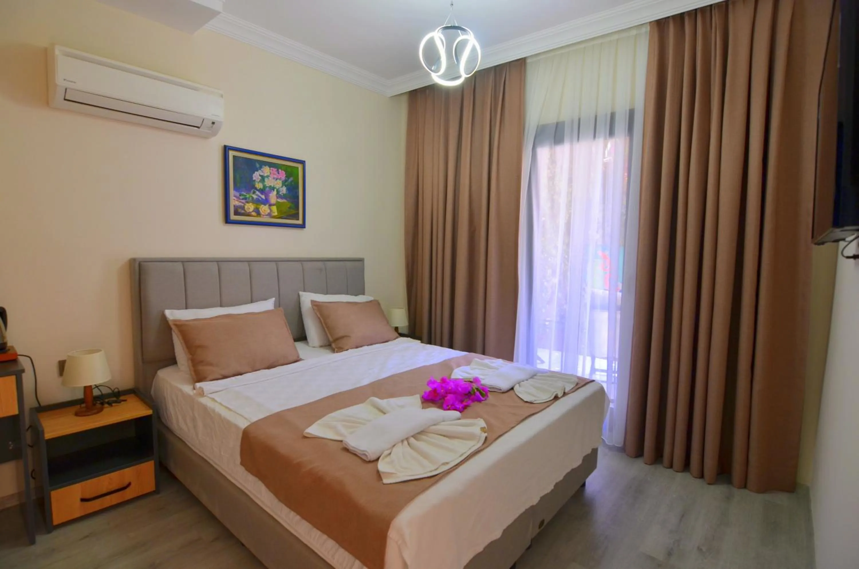 Bed in Mykonut Boutique Suites
