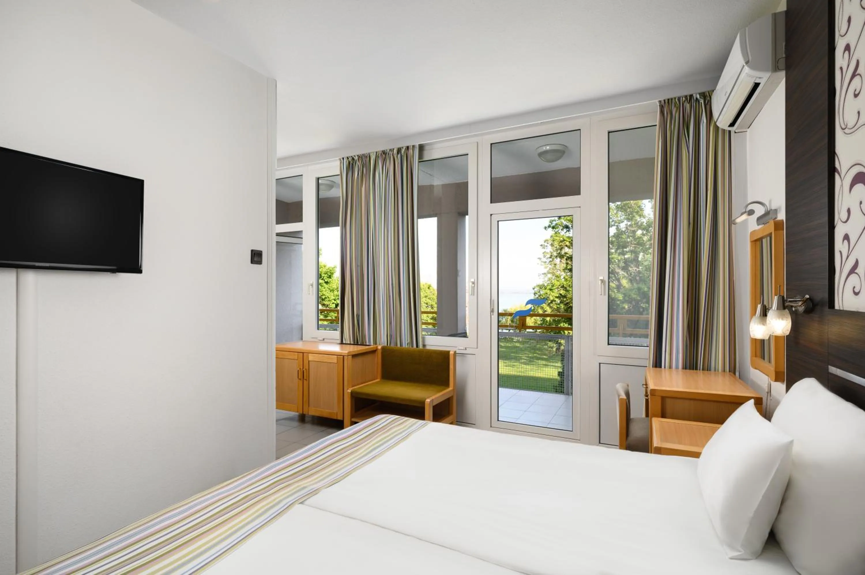 Photo of the whole room, Bed in Danubius Hotel Marina