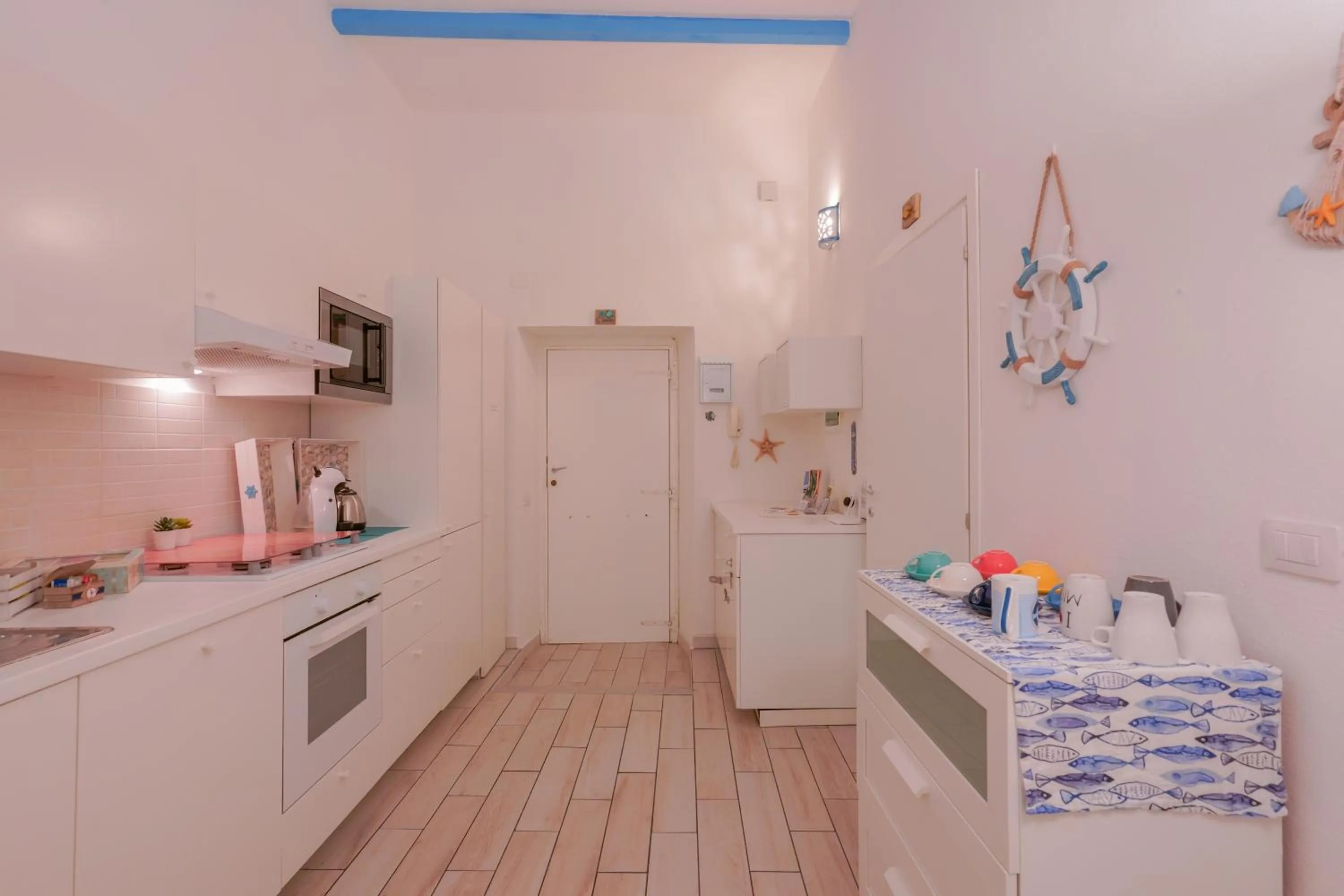 Kitchen or kitchenette in Approdo Rooms - Eja Sardinia