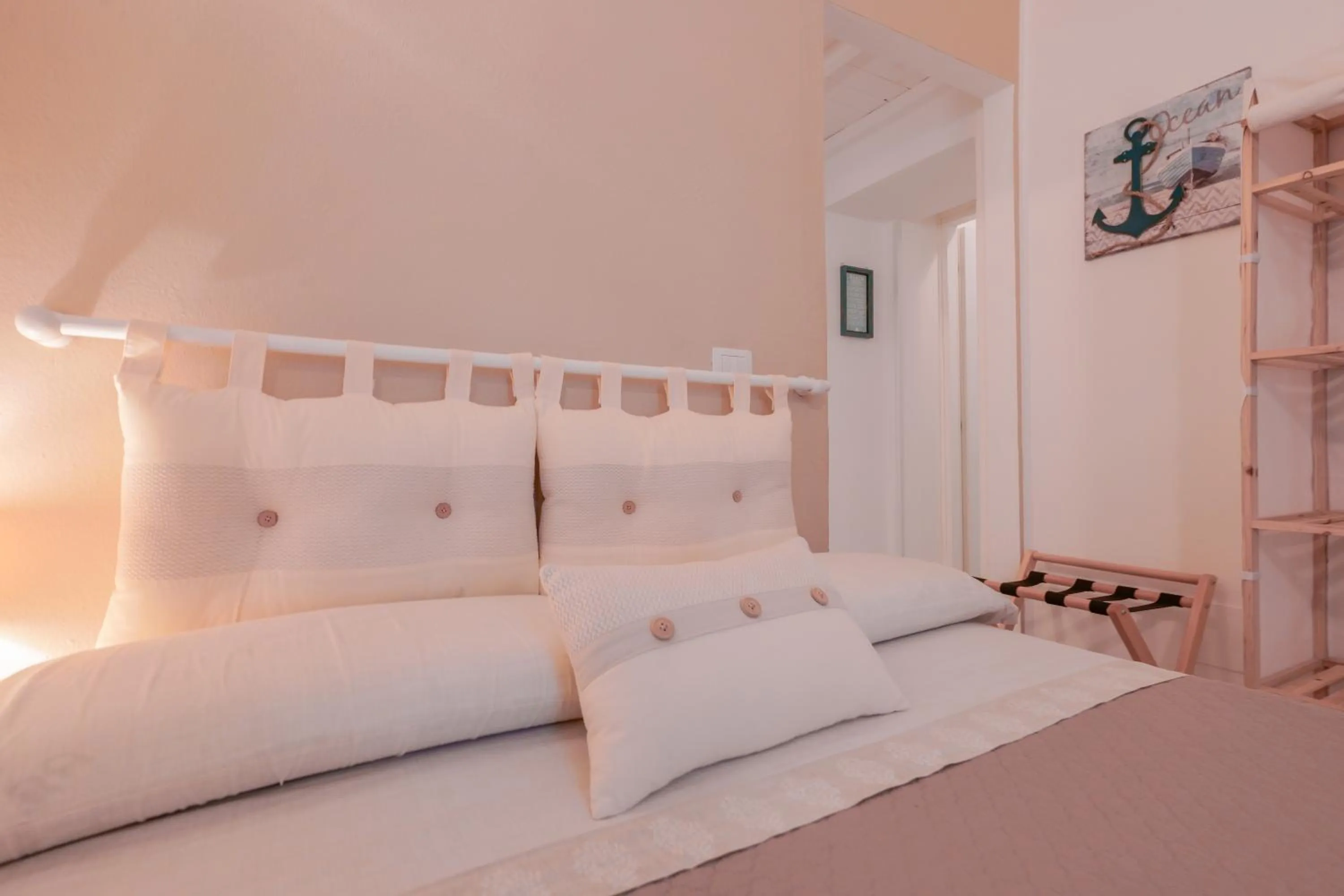Bed in Approdo Rooms - Eja Sardinia