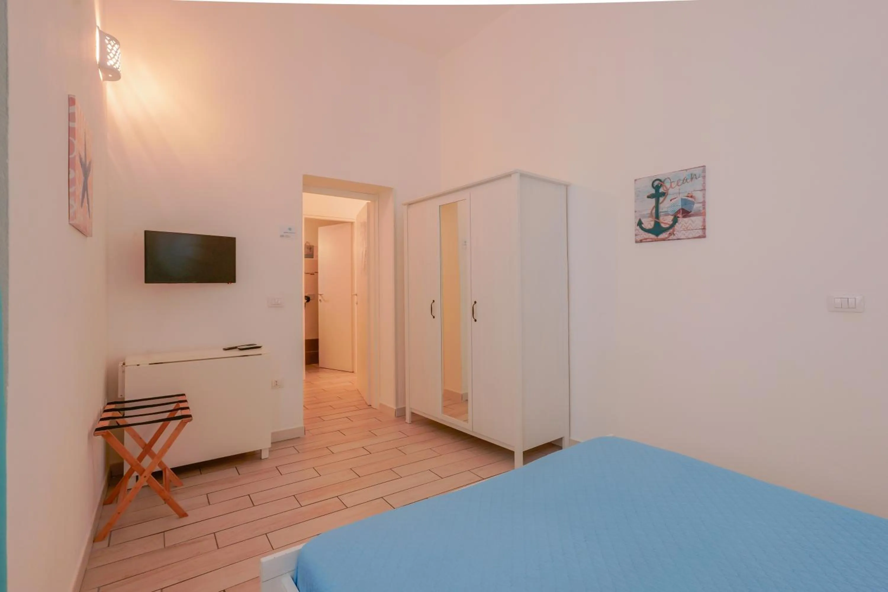 Bed in Approdo Rooms - Eja Sardinia