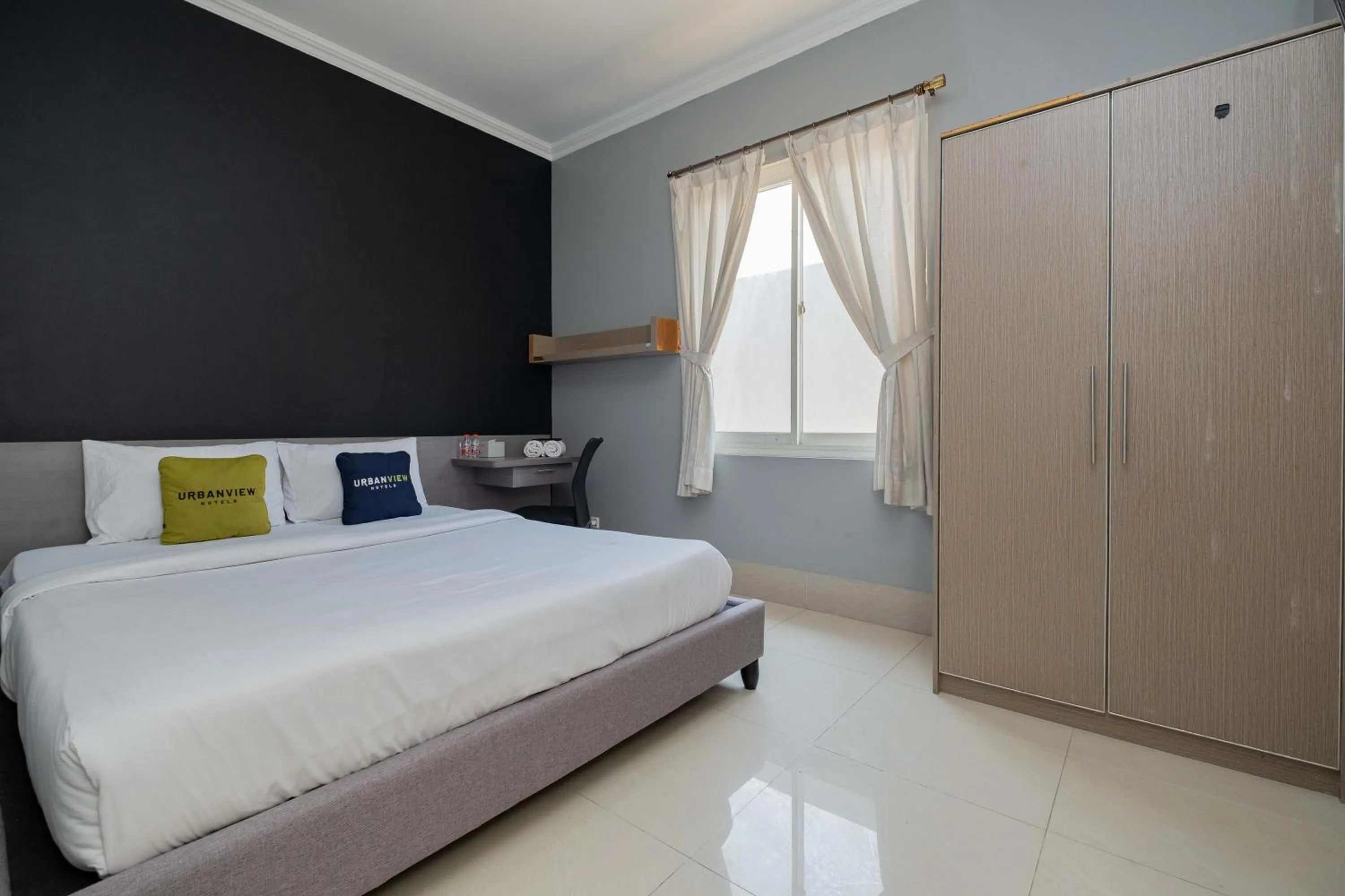 Bed in Urbanview Hotel Stariez Karawaci Tangerang by RedDoorz