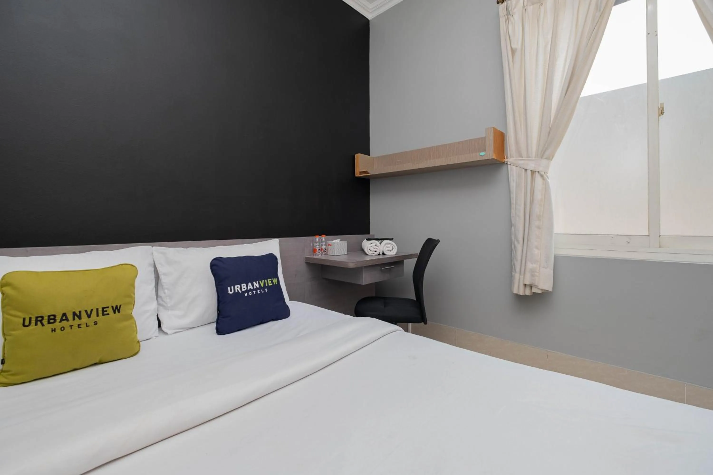 Bed in Urbanview Hotel Stariez Karawaci Tangerang by RedDoorz