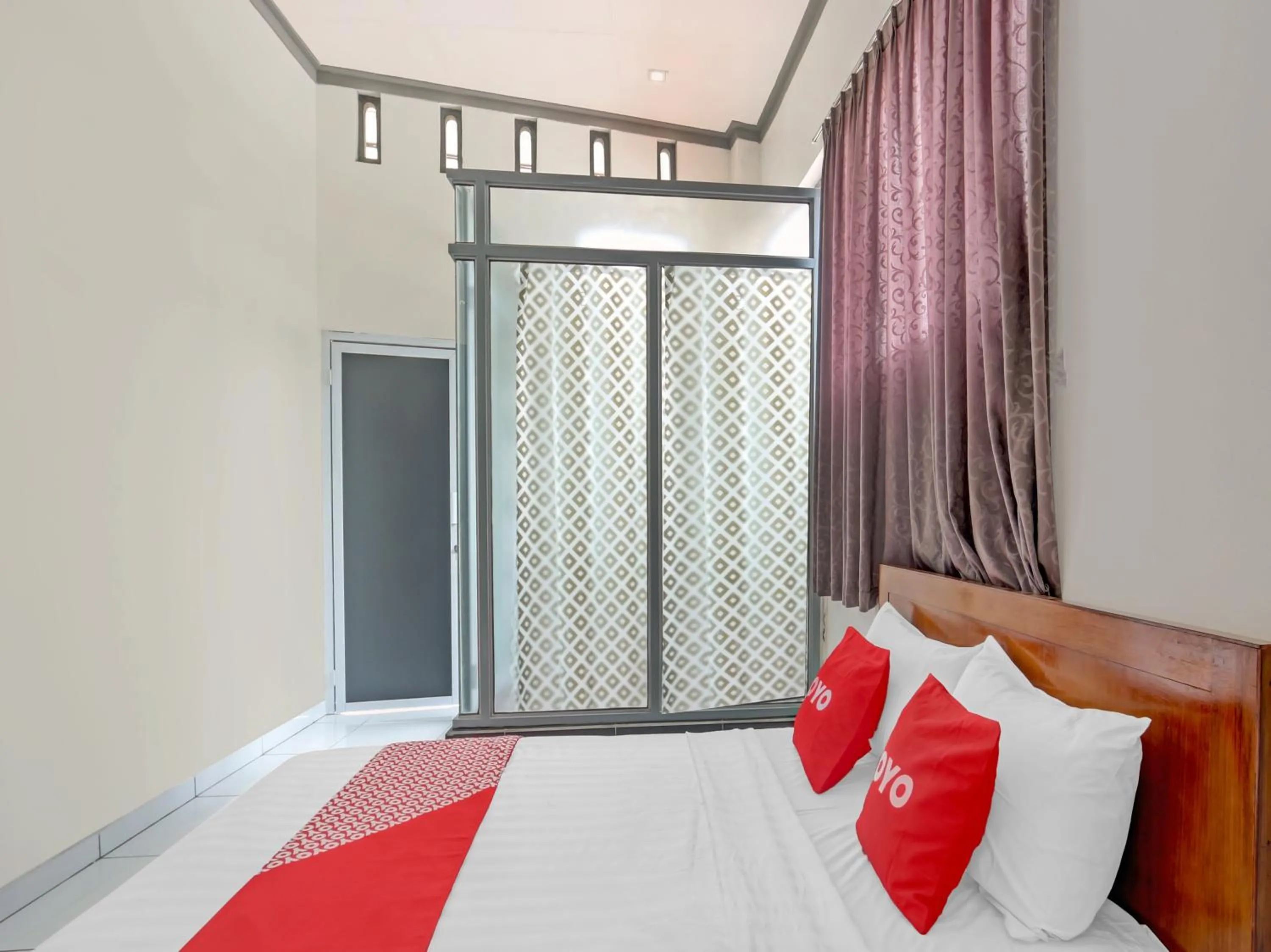 Bedroom in OYO 90517 Homestay Wonosobo Asri