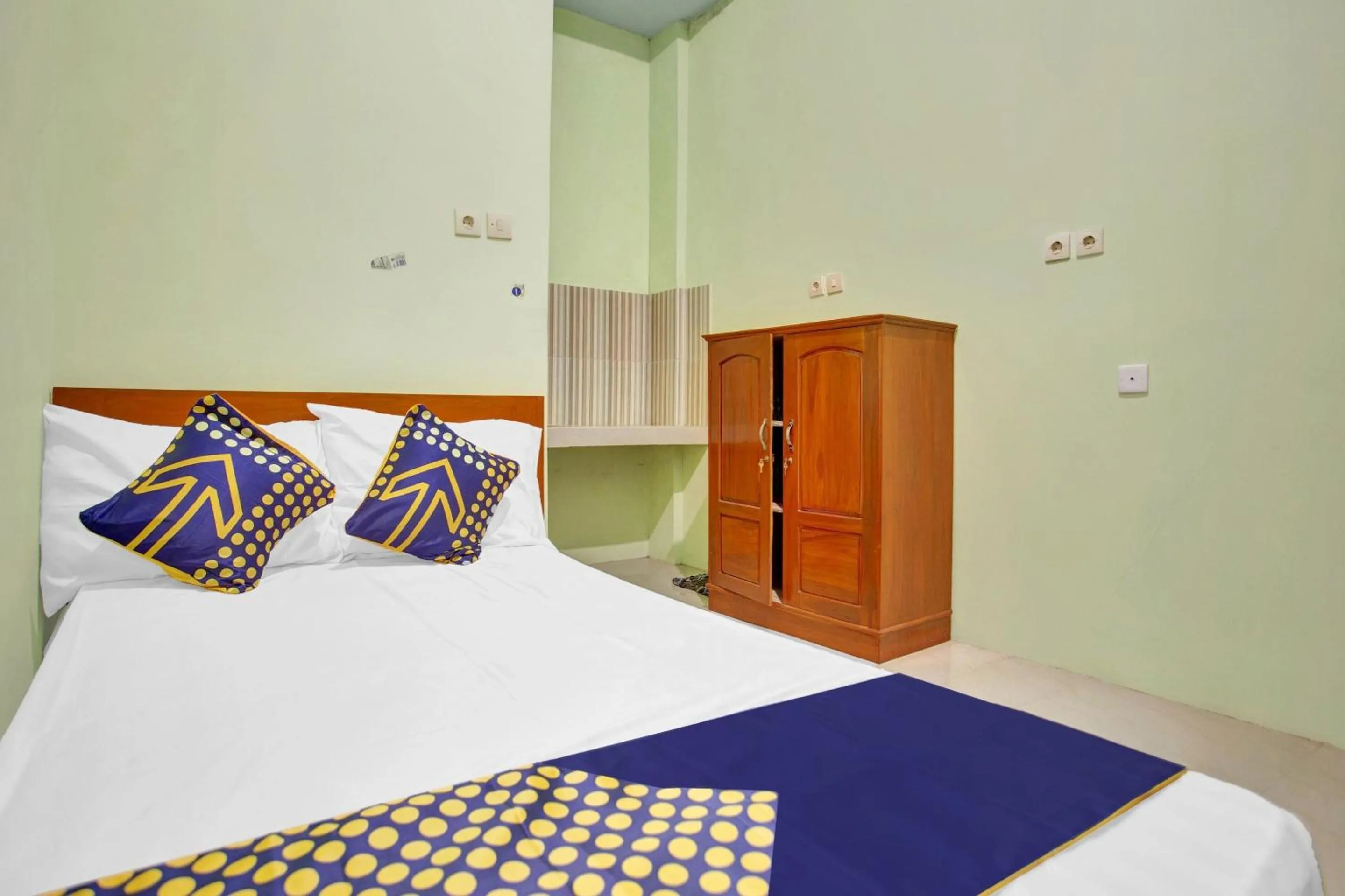 Bedroom in OYO 90537 De Wisma Emas