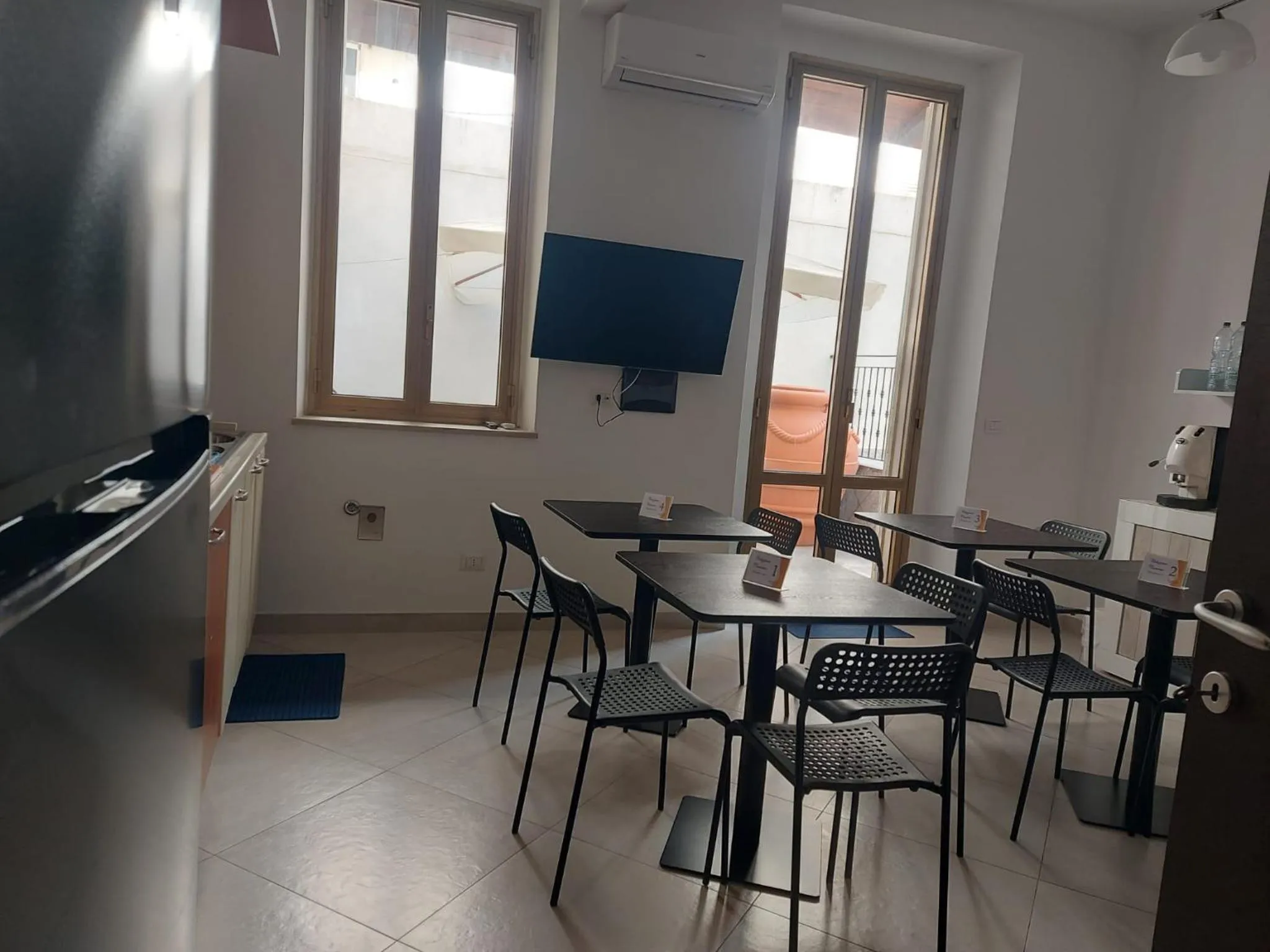 Communal lounge/ TV room in Arte Mia B&B