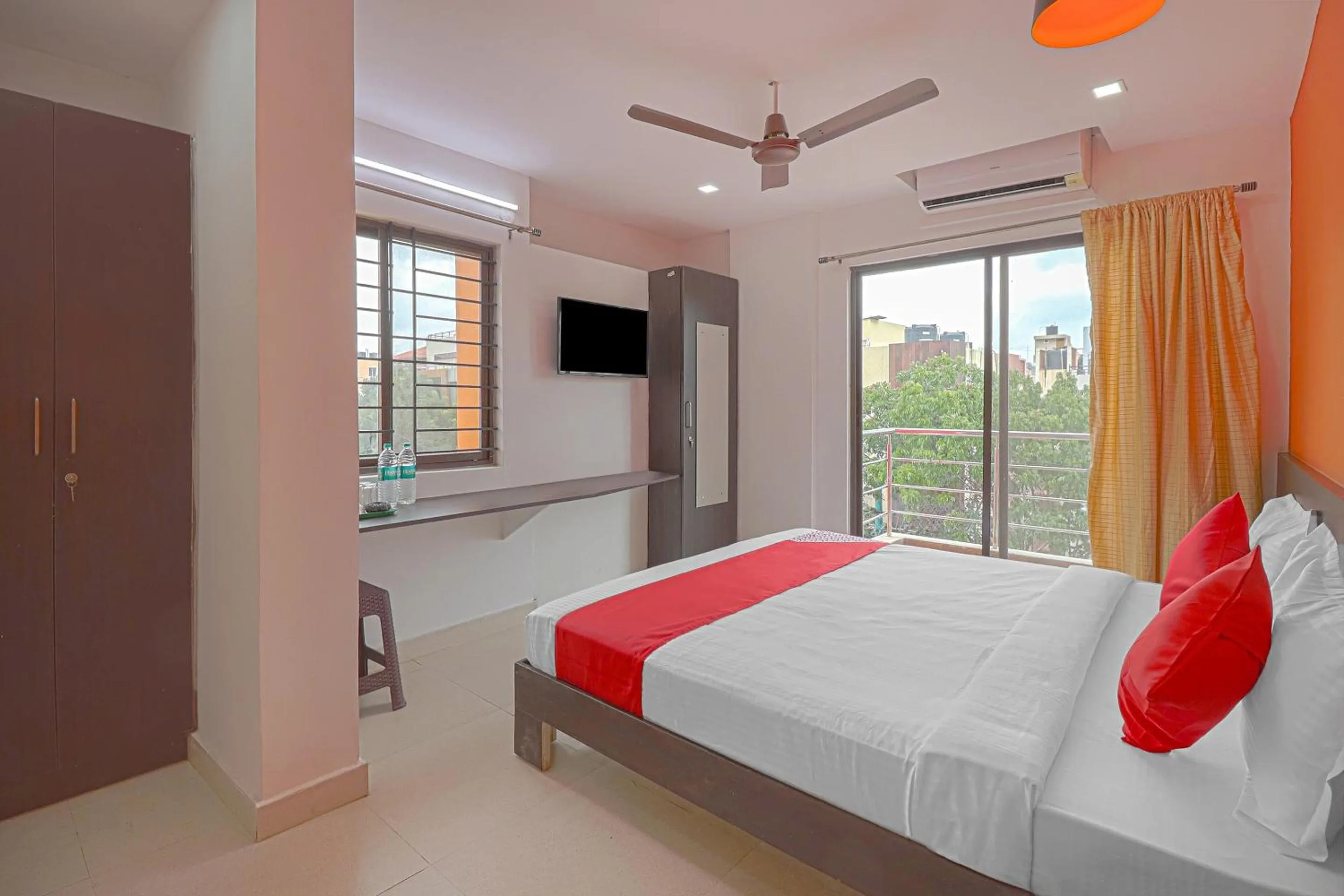 Bedroom in Hotel O Blooms residency