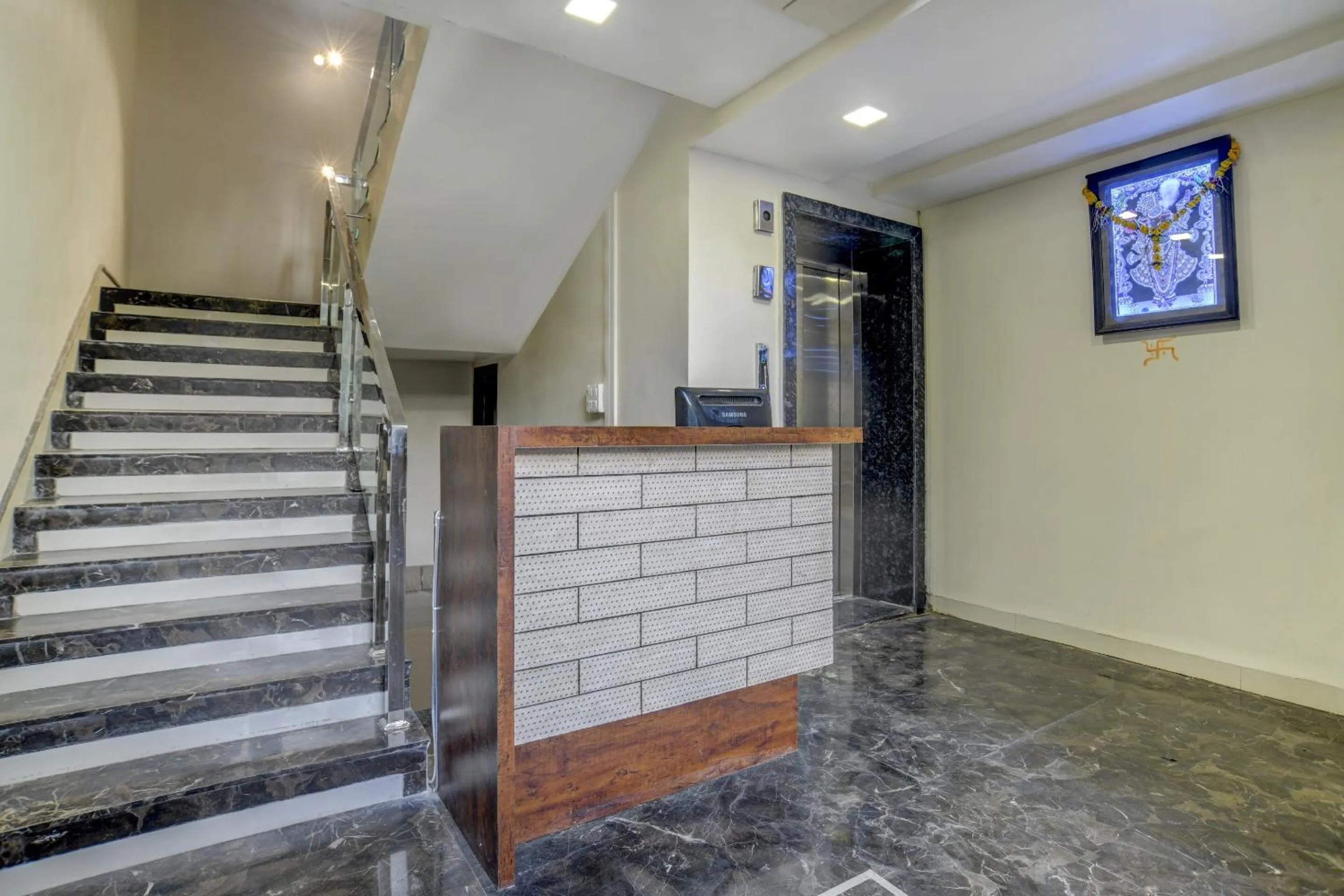 Lobby or reception in Capital O Abri Krishna