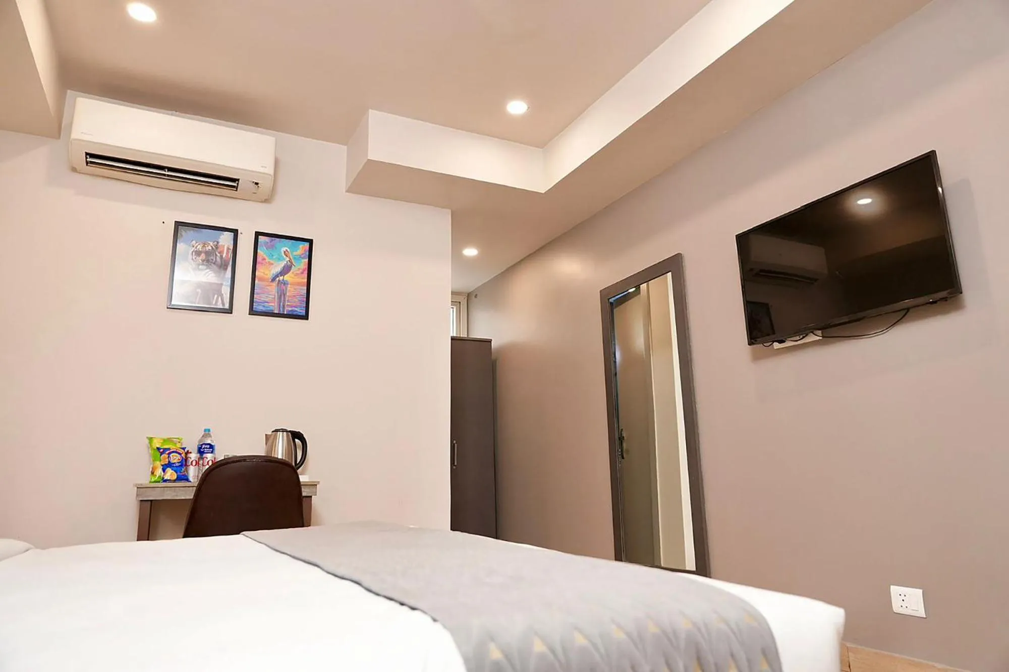 Bed in FabHotel Kirti Nagar