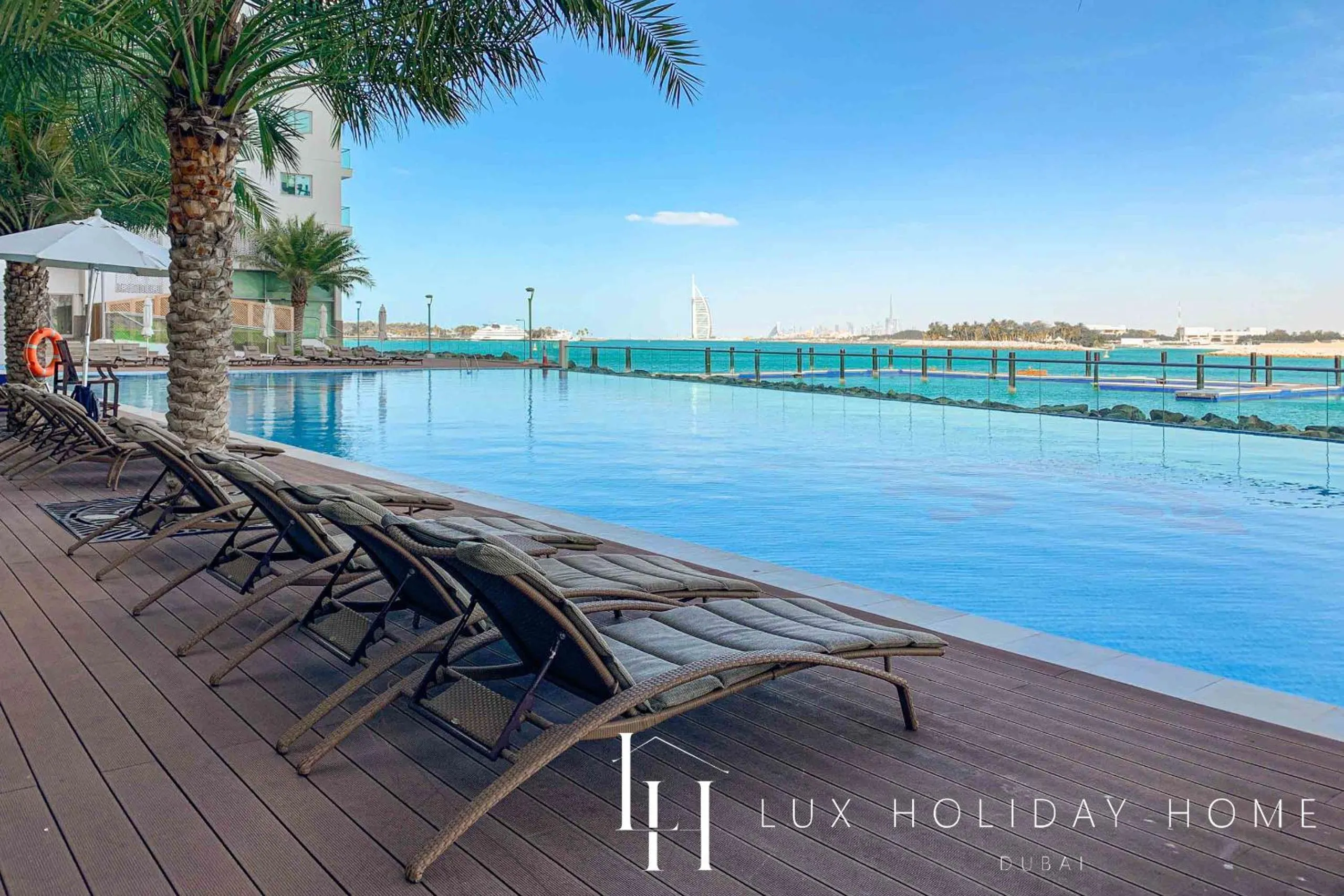 Swimming pool in LUX Opulent Island Suite 6 Burj View