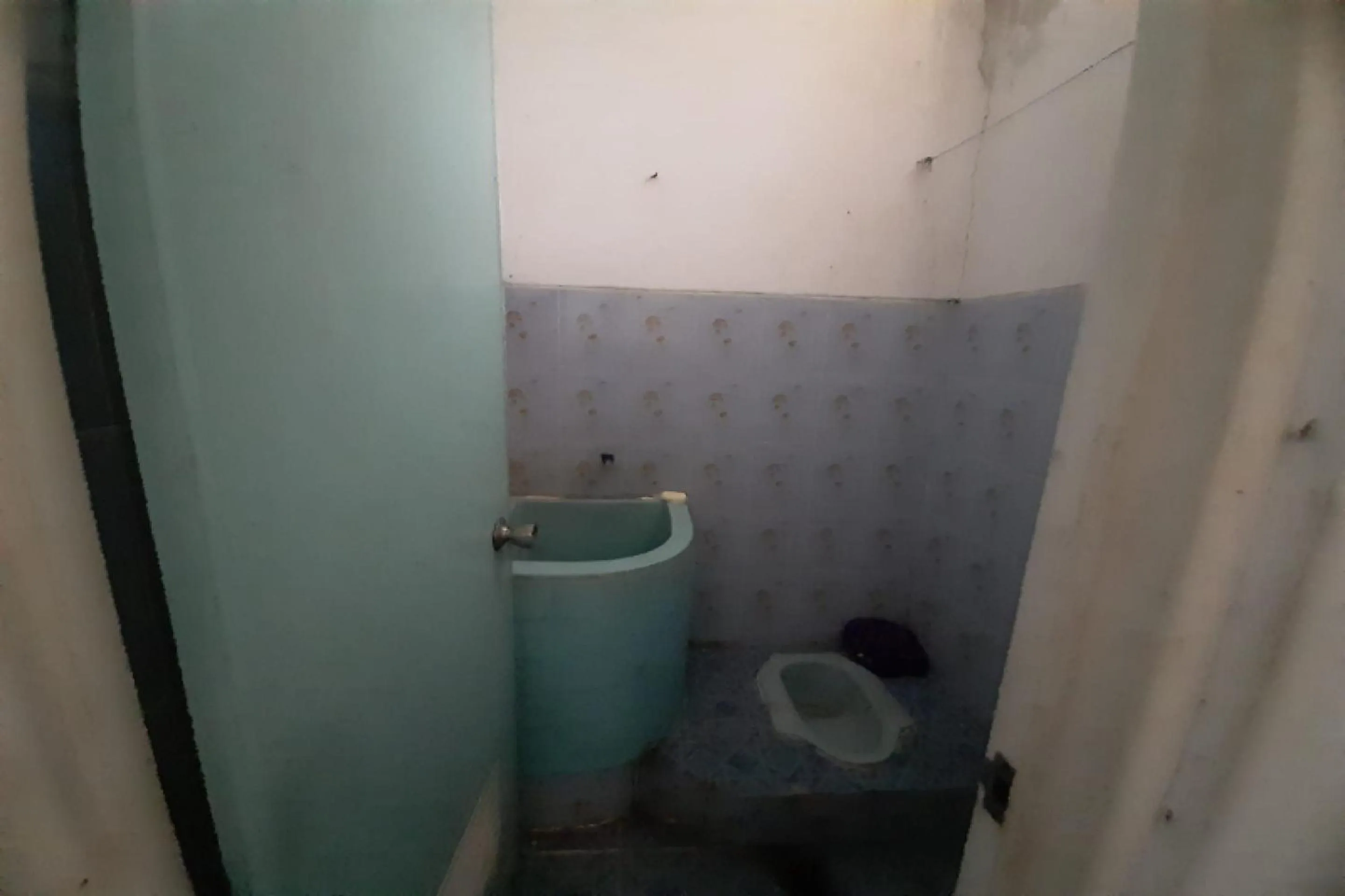 Bathroom in OYO 90555 Vina Pavilion