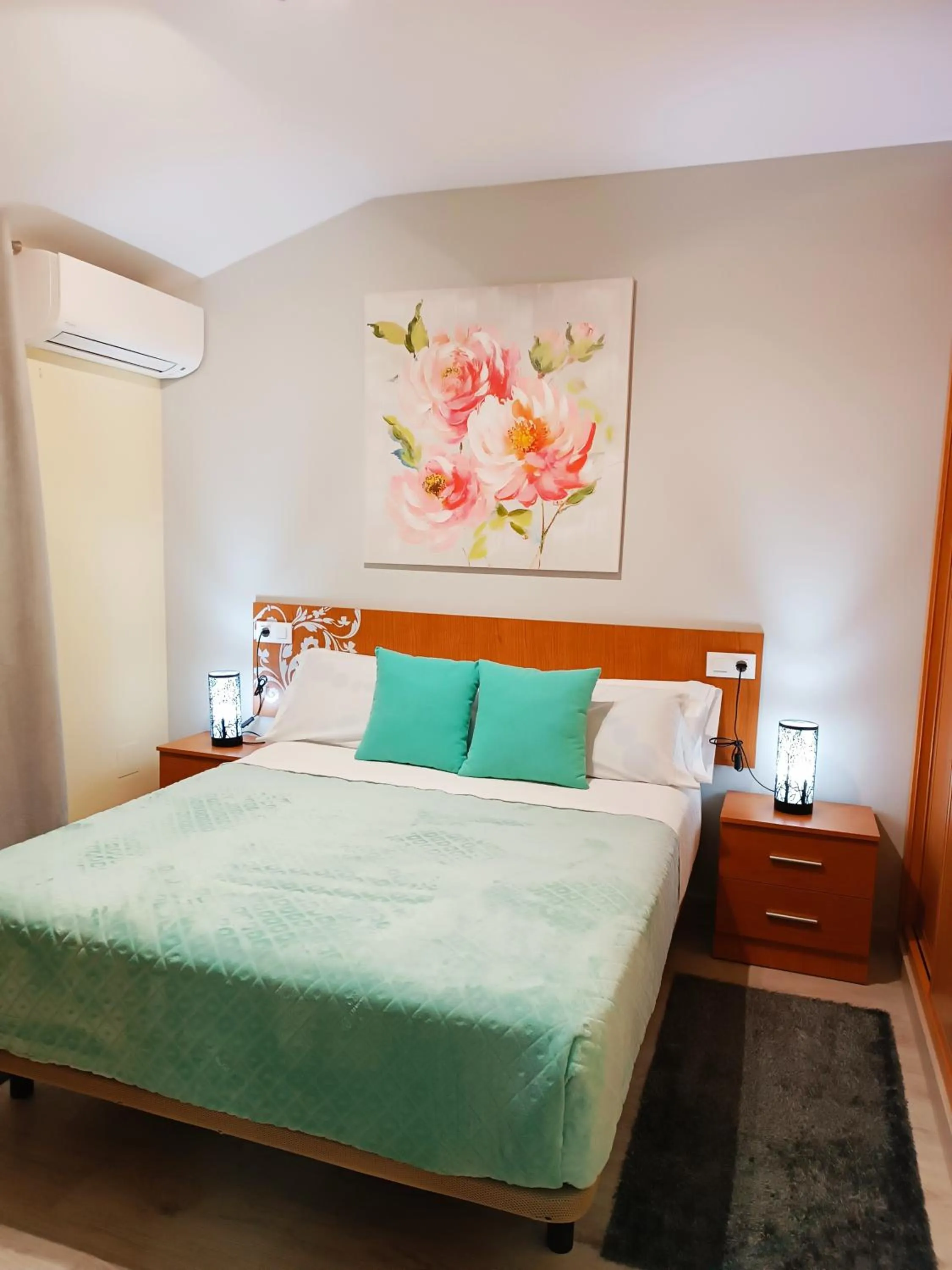 Bed in Hotel Alma Rosa