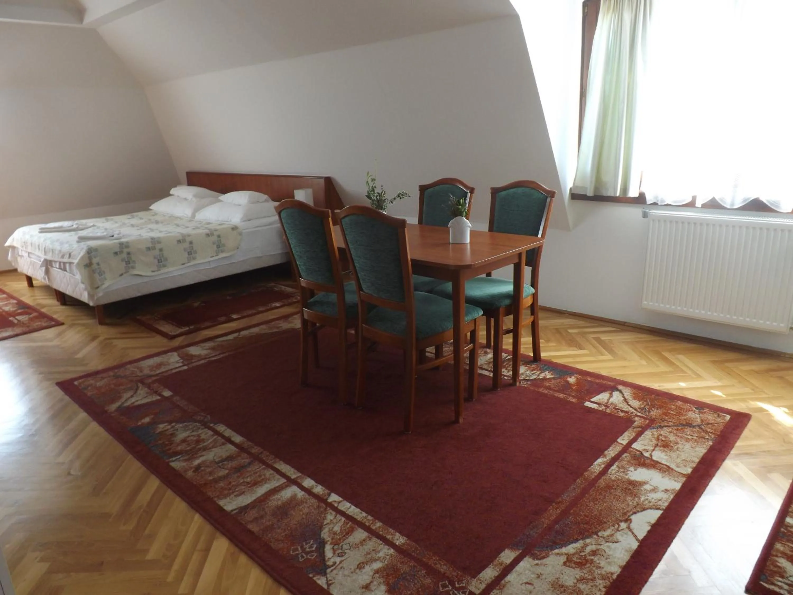 Bed in HELIOS Hotel Apartments