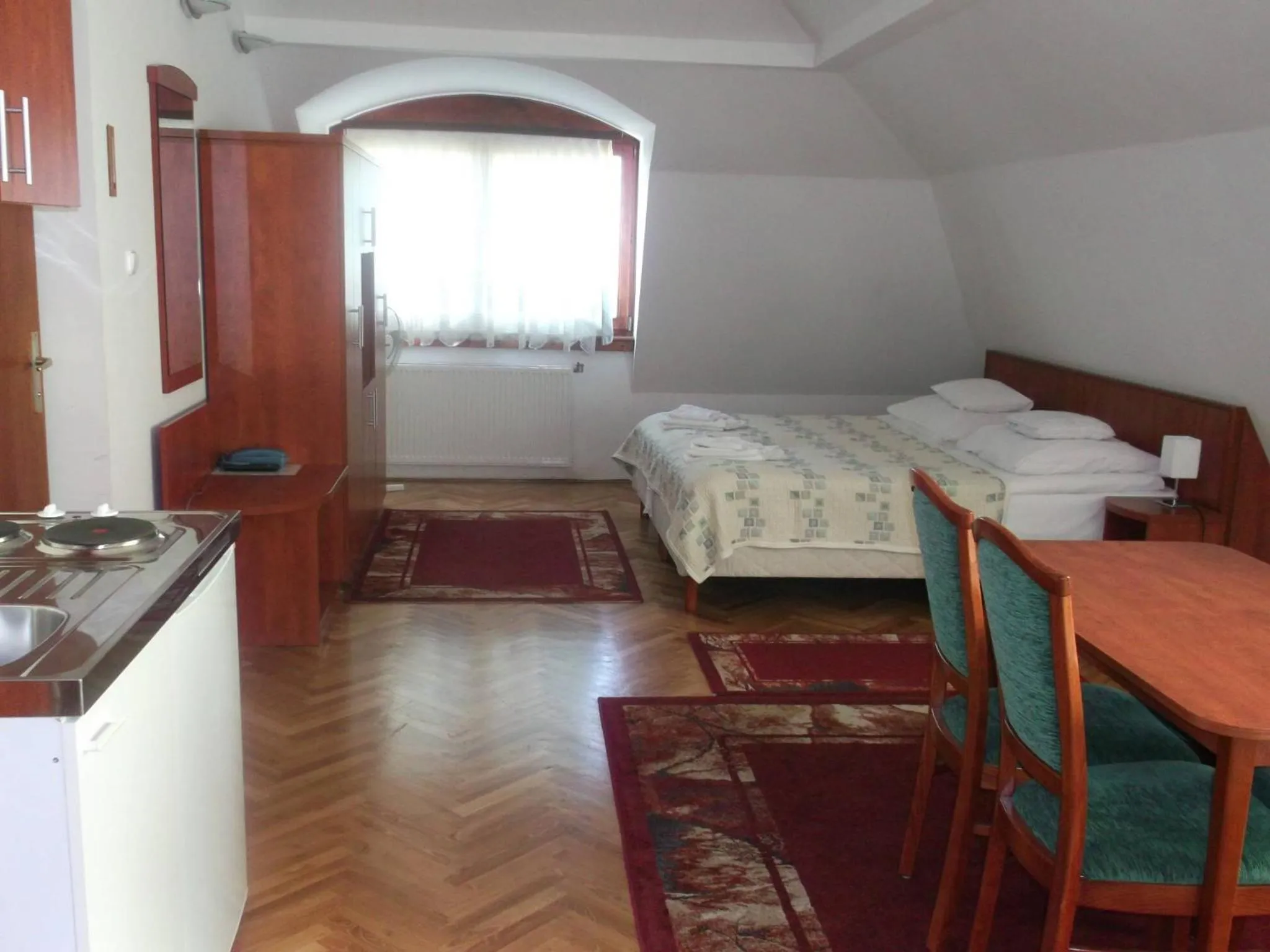 Kitchen or kitchenette, Bed in HELIOS Hotel Apartments