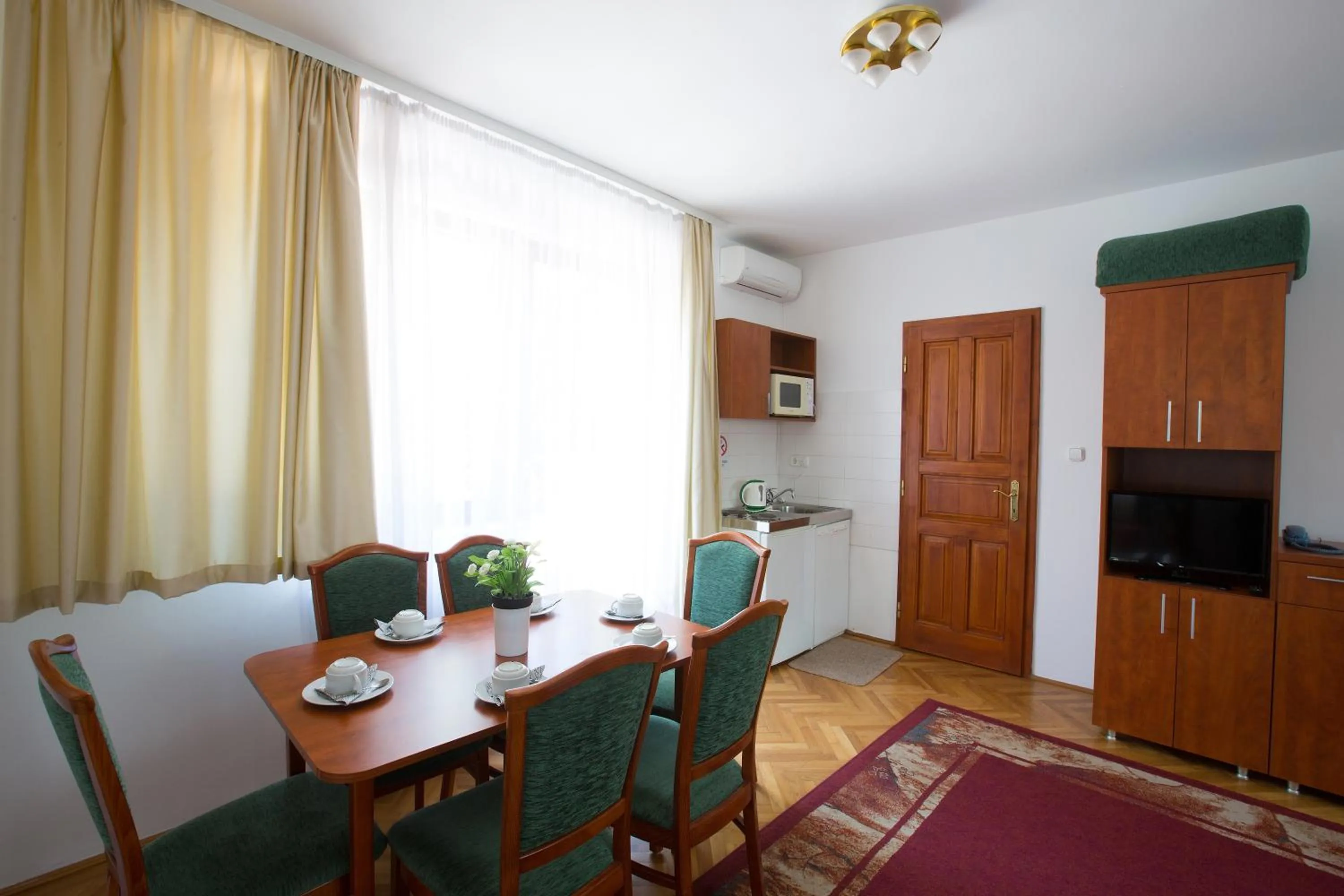 Kitchen or kitchenette in HELIOS Hotel Apartments