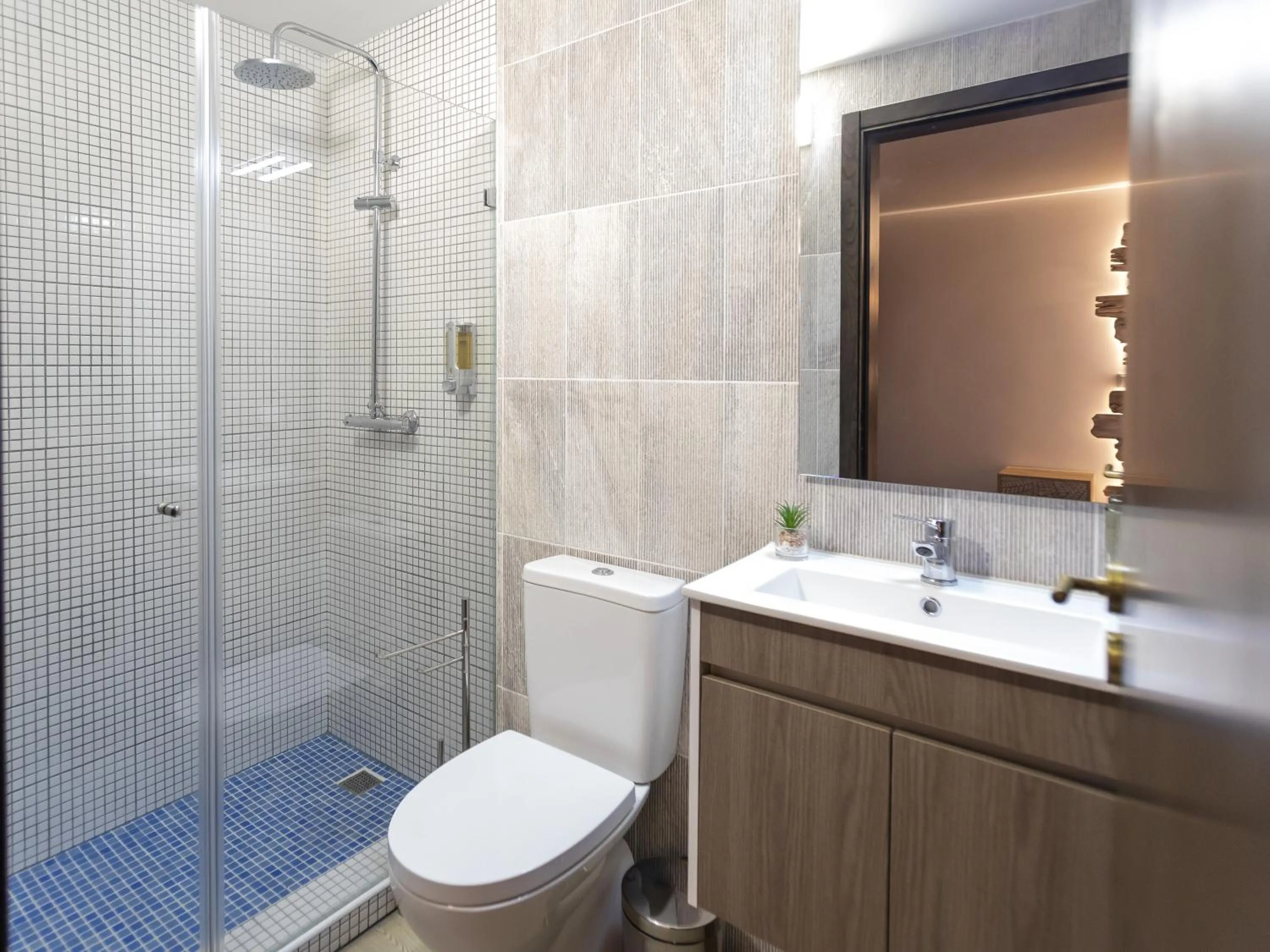 Bathroom in Golden Mirror