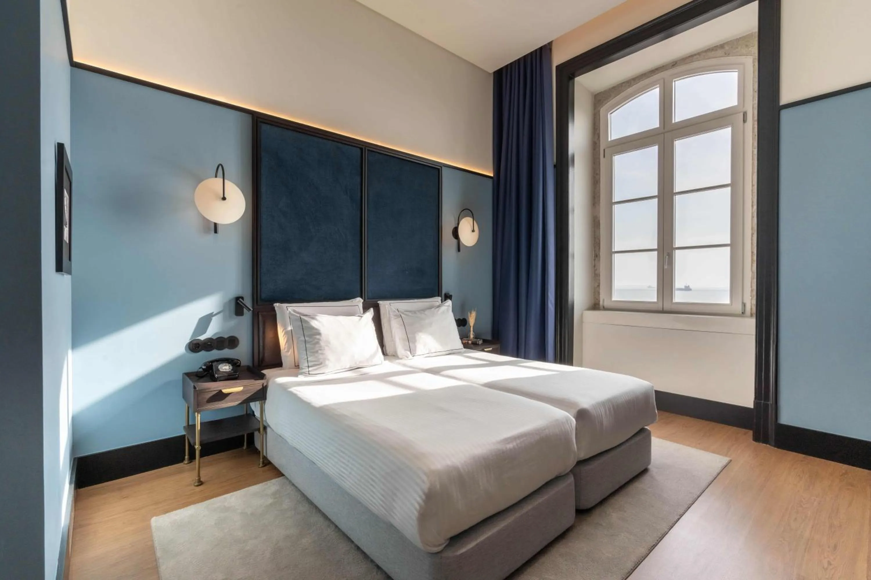 Bedroom, Bed in The Editory Riverside Hotel, an Historic Hotel