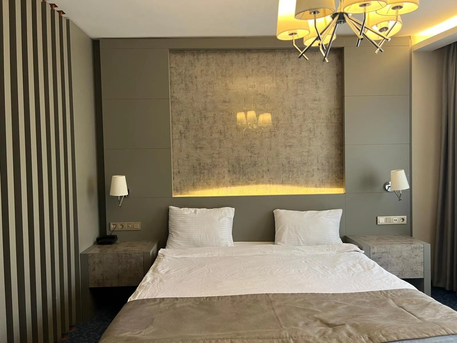 Bed in Acar Suite Hotel