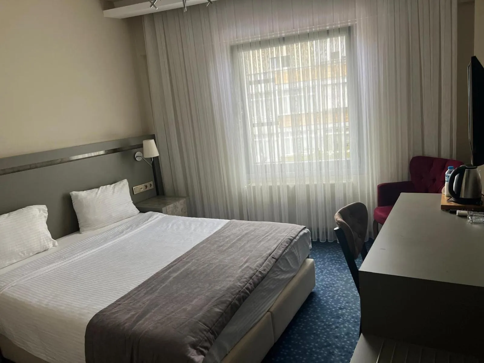 Bed in Acar Suite Hotel