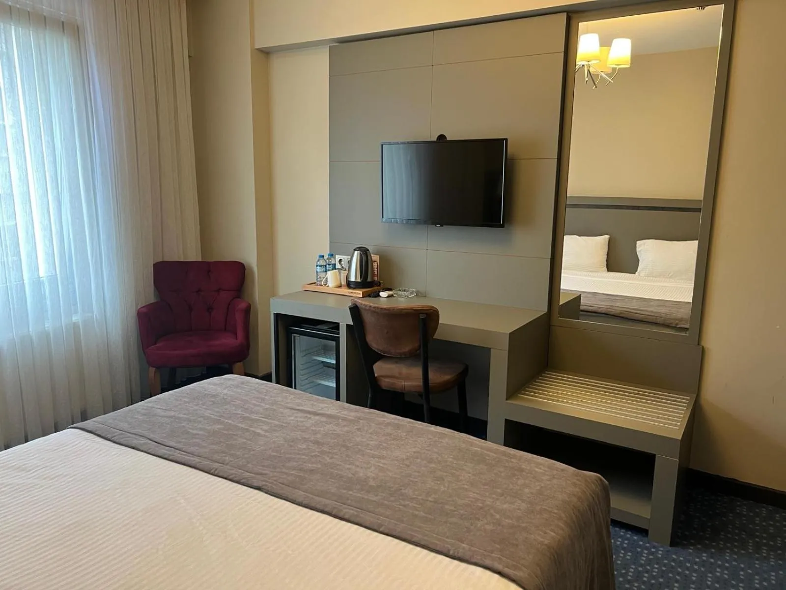 Bed in Acar Suite Hotel