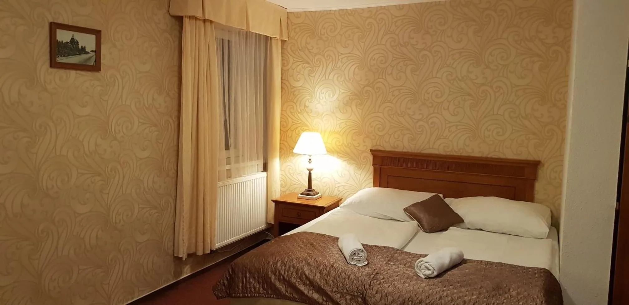 Bed in Hotel Pomezí