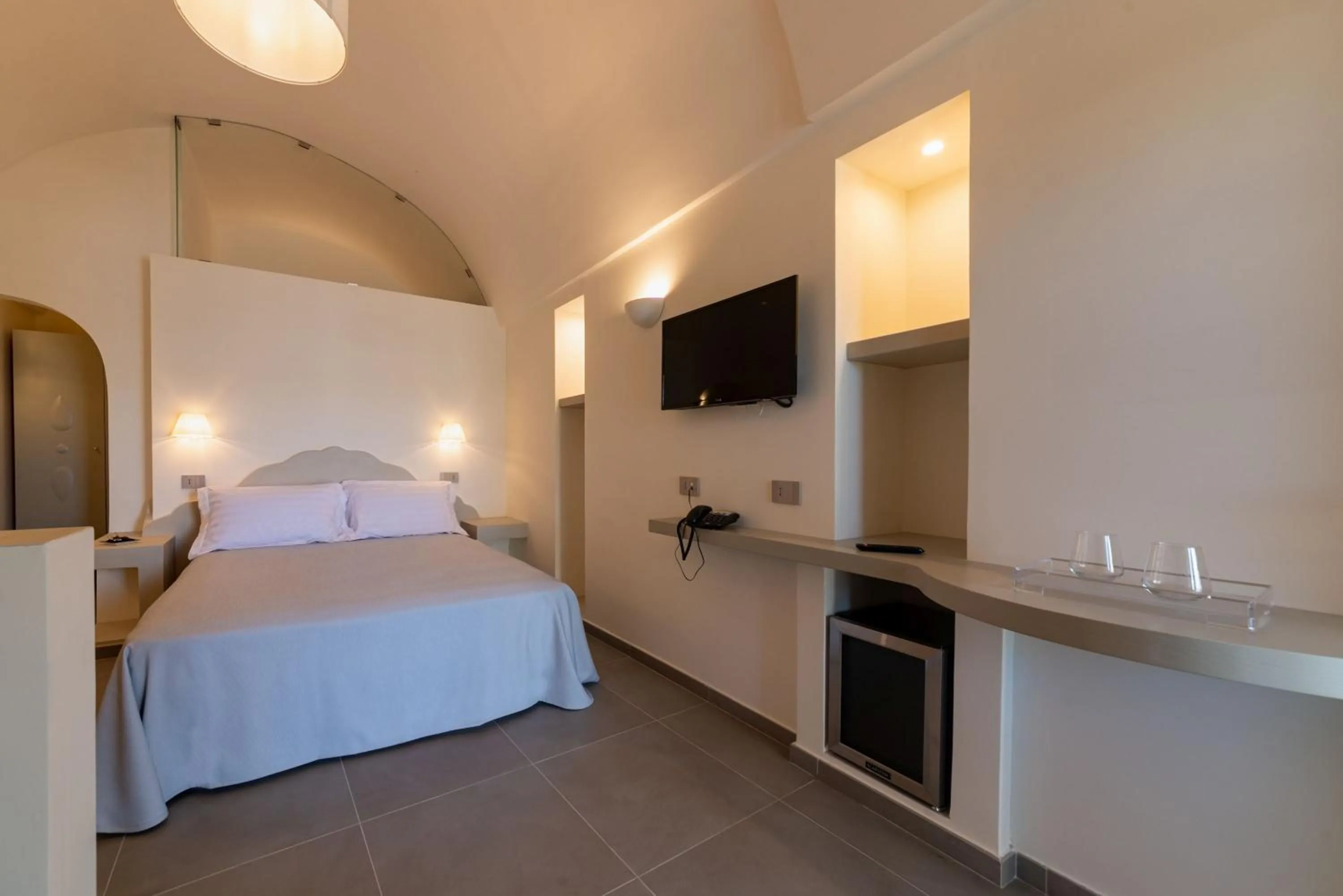Bed in Insula Boutique Hotel