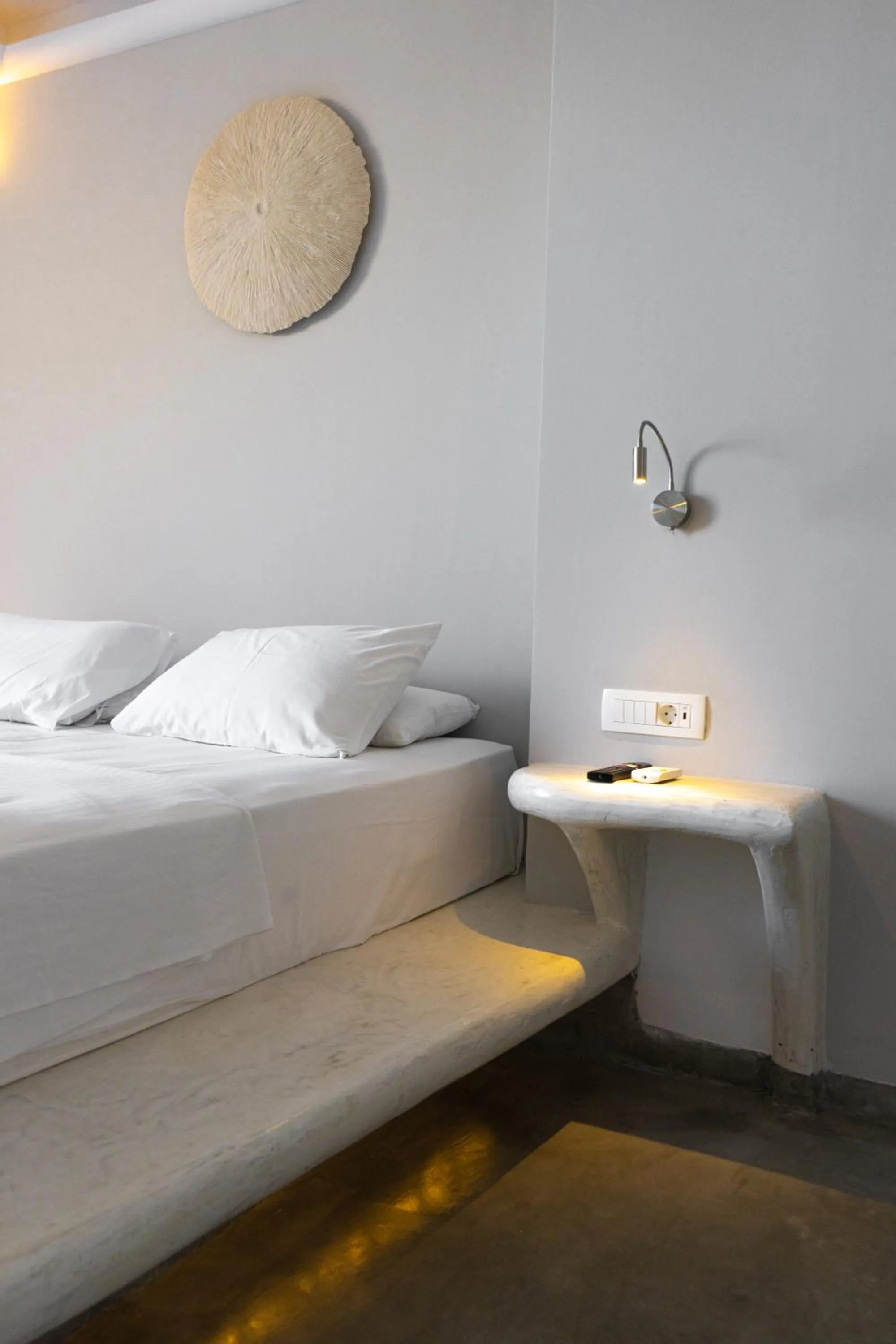 Bed in Demilmar Luxury Suites