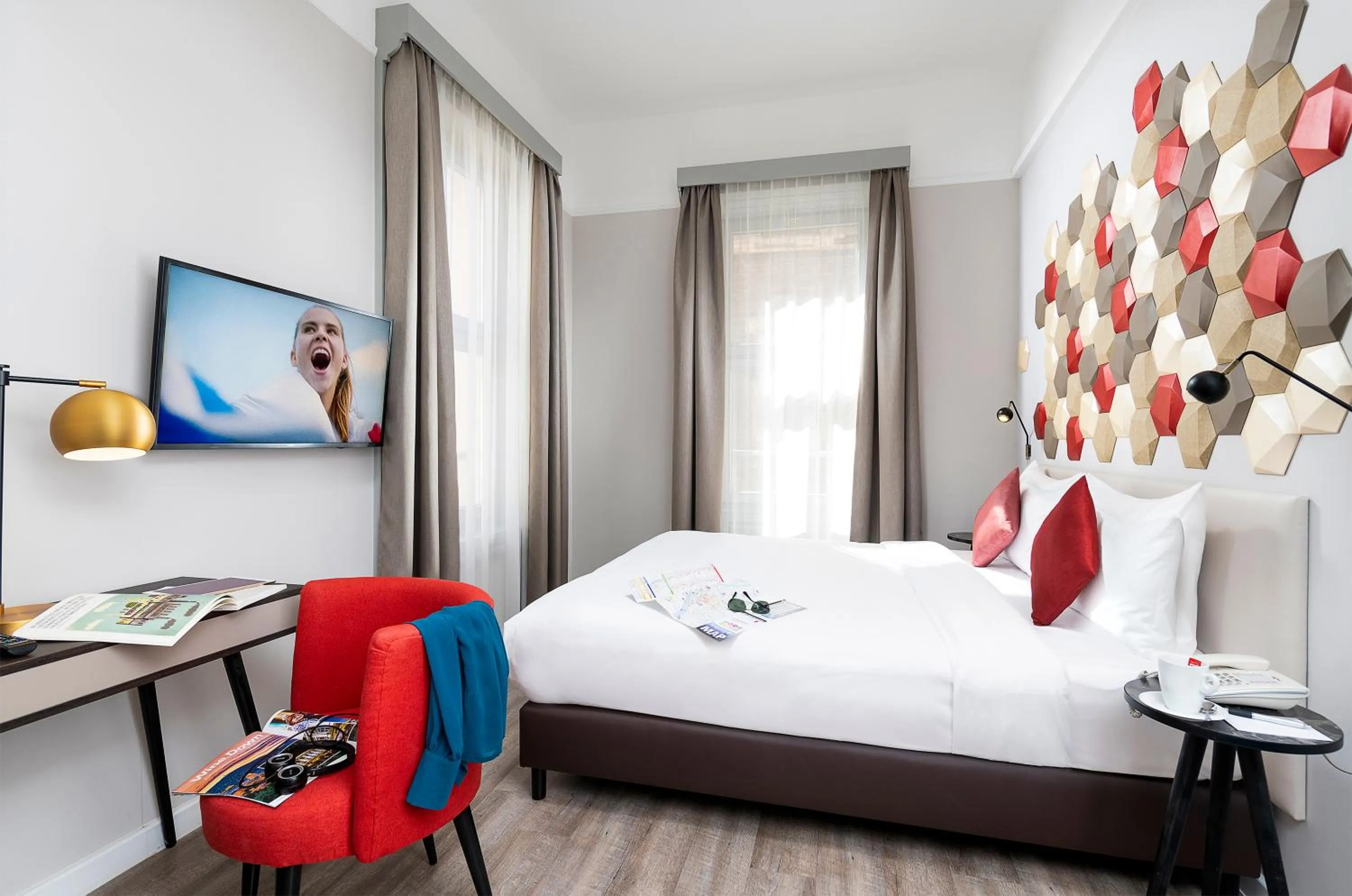 Bed in Three Corners Hotel Art