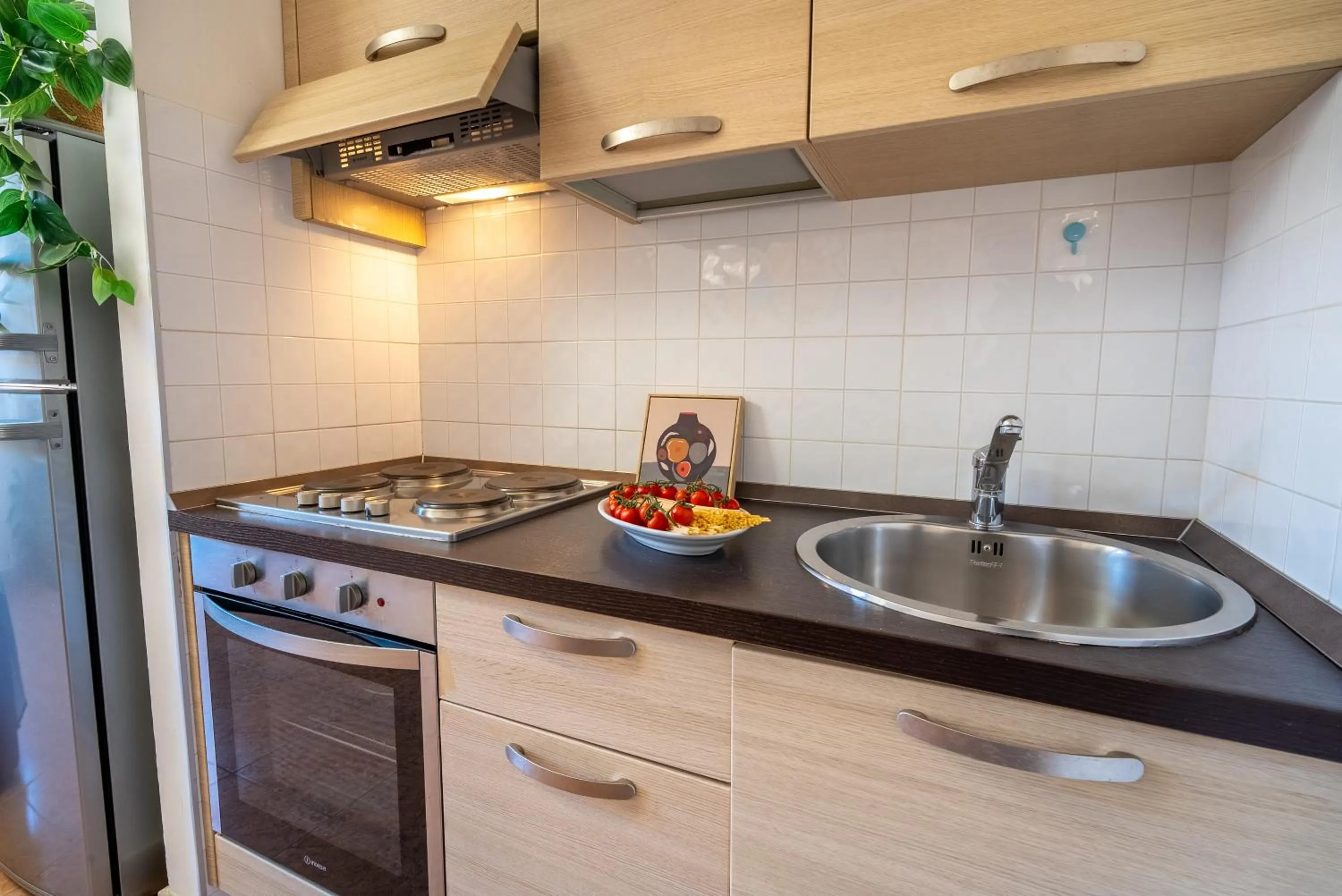 Kitchen or kitchenette in Residence La Rosa di Nettuno