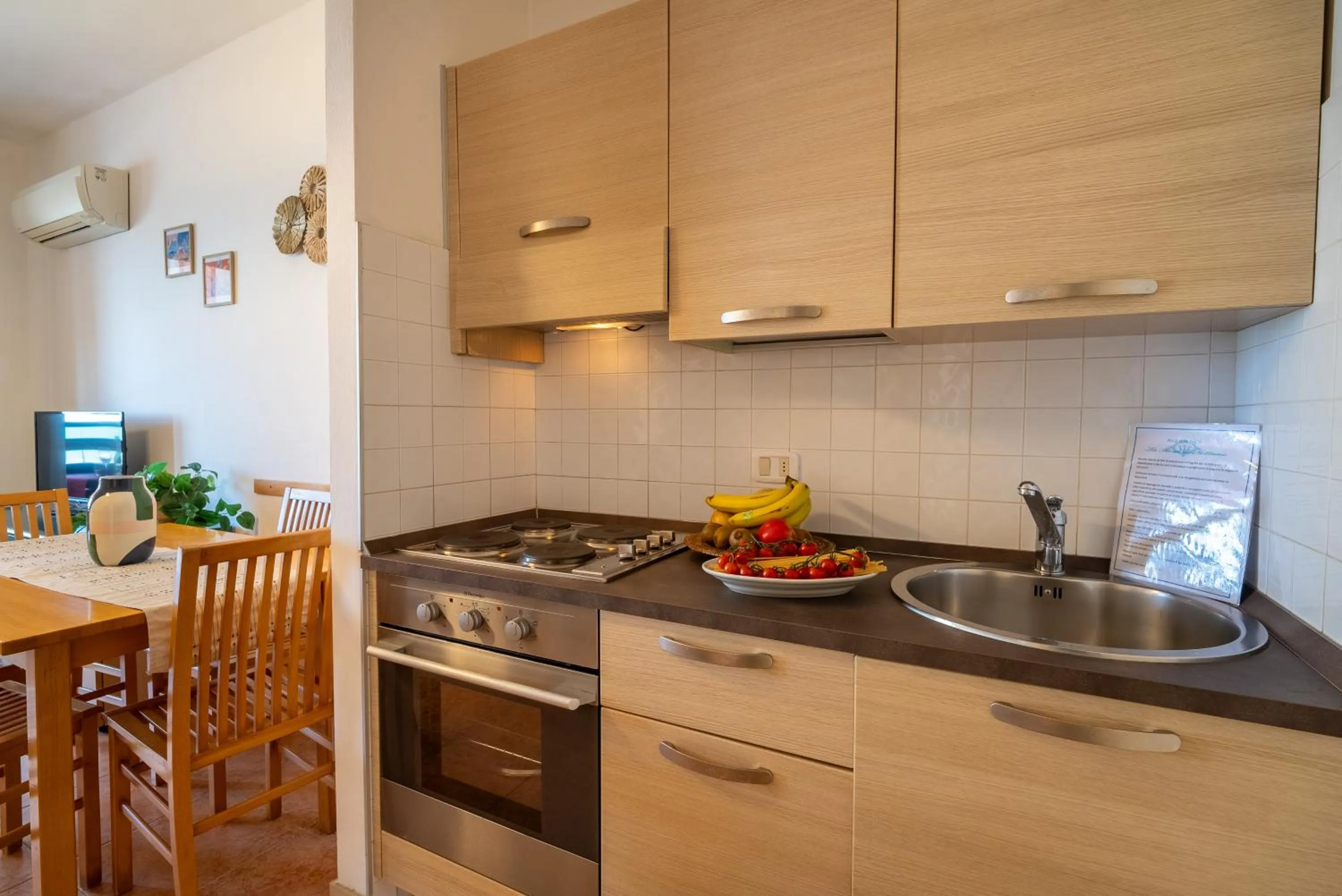 Dining area in Residence La Rosa di Nettuno