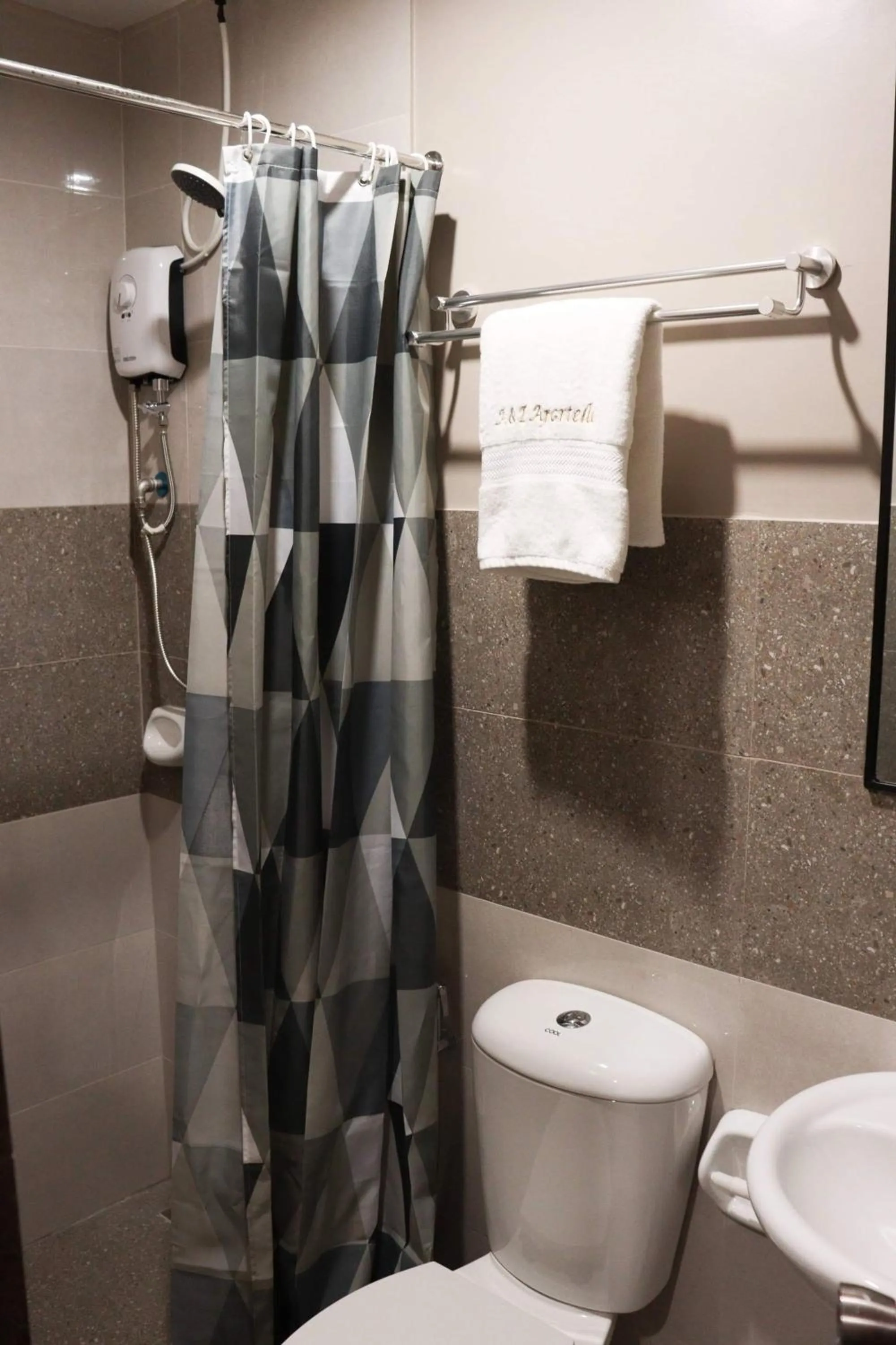 Bathroom in A&E Apartelle