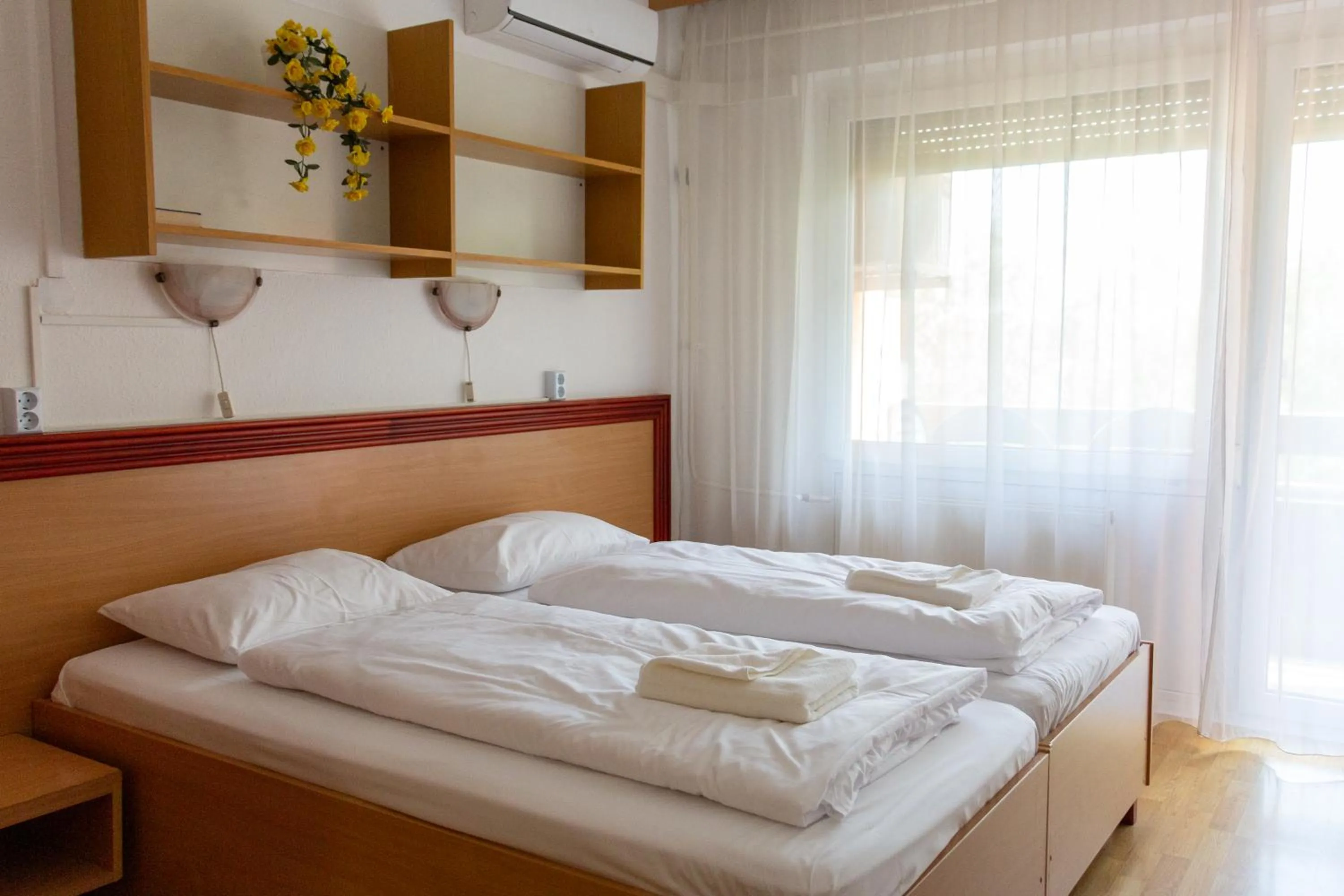 Bed in Tisza Sport Hotel