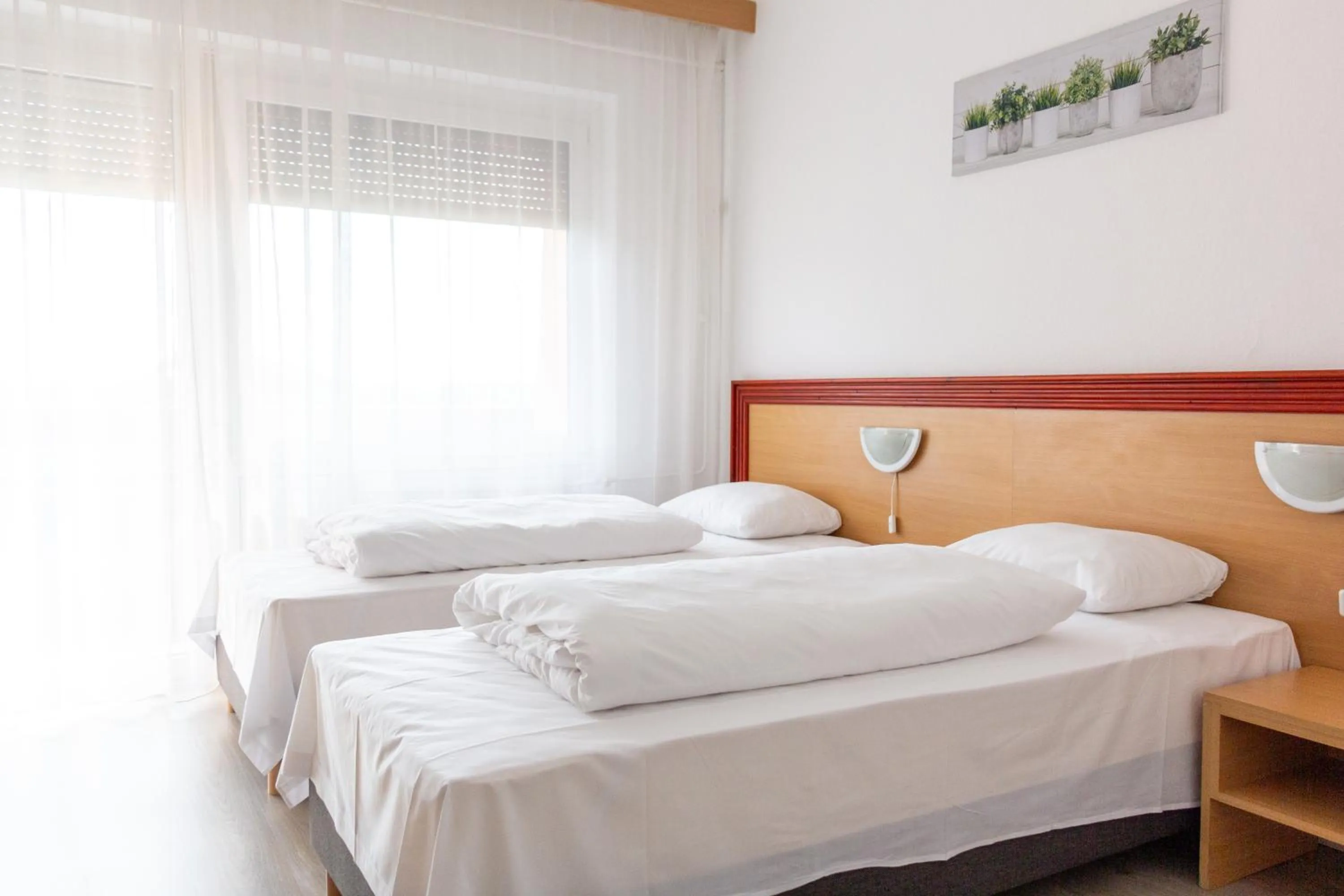 Bed in Tisza Sport Hotel