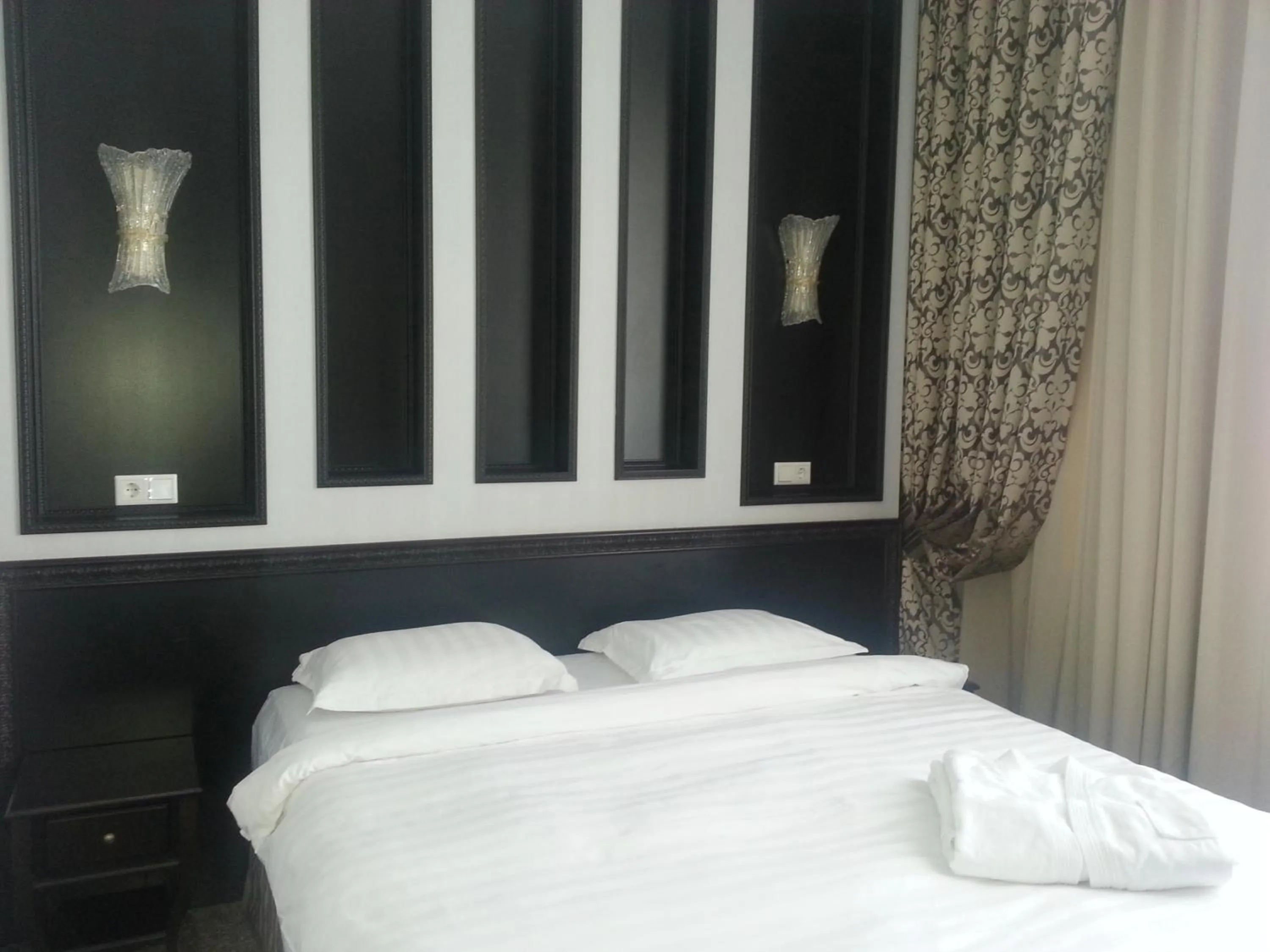 Bed in Royal Petrol Hotel