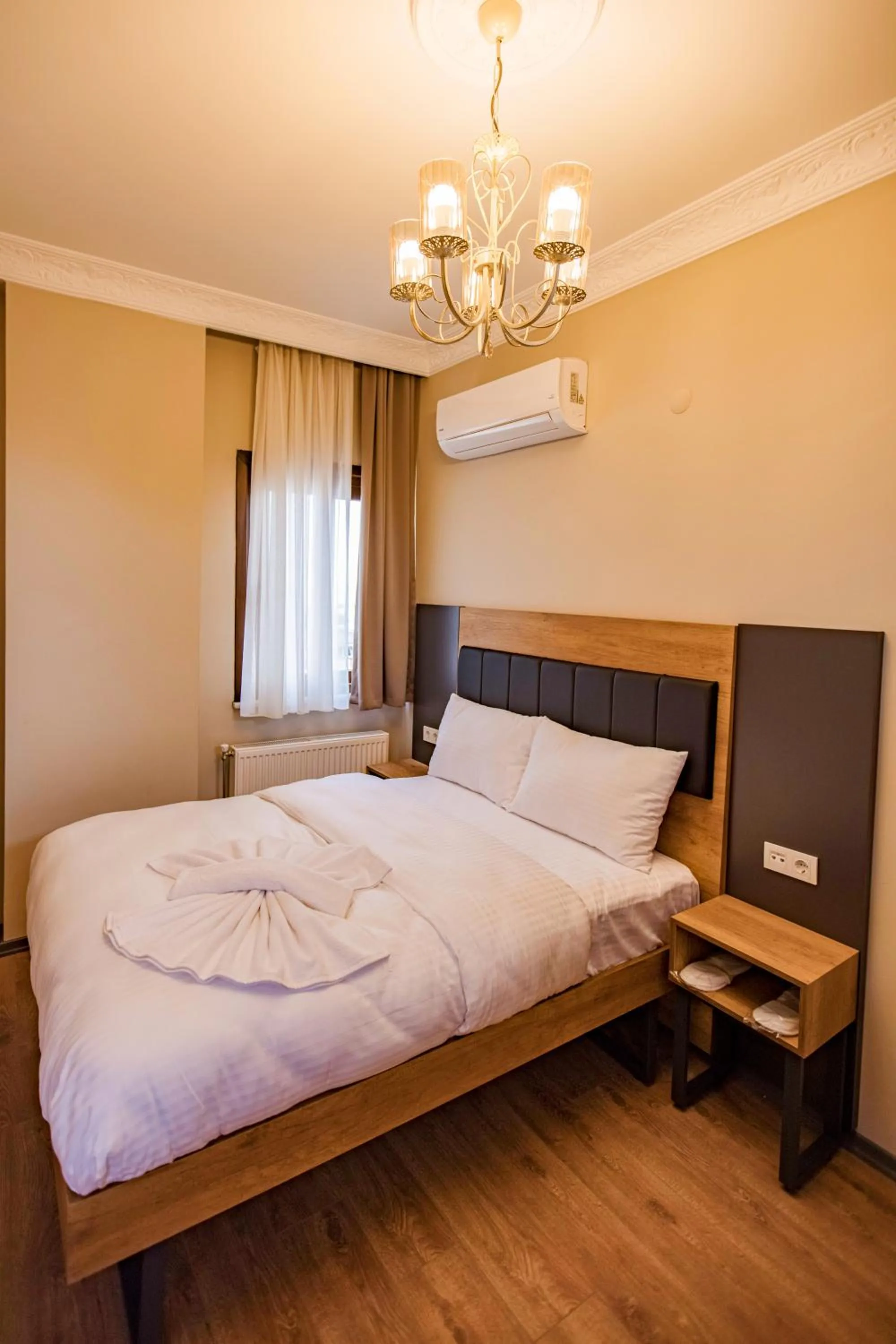 Bed in Grand Balyan Hotel & Restaurant