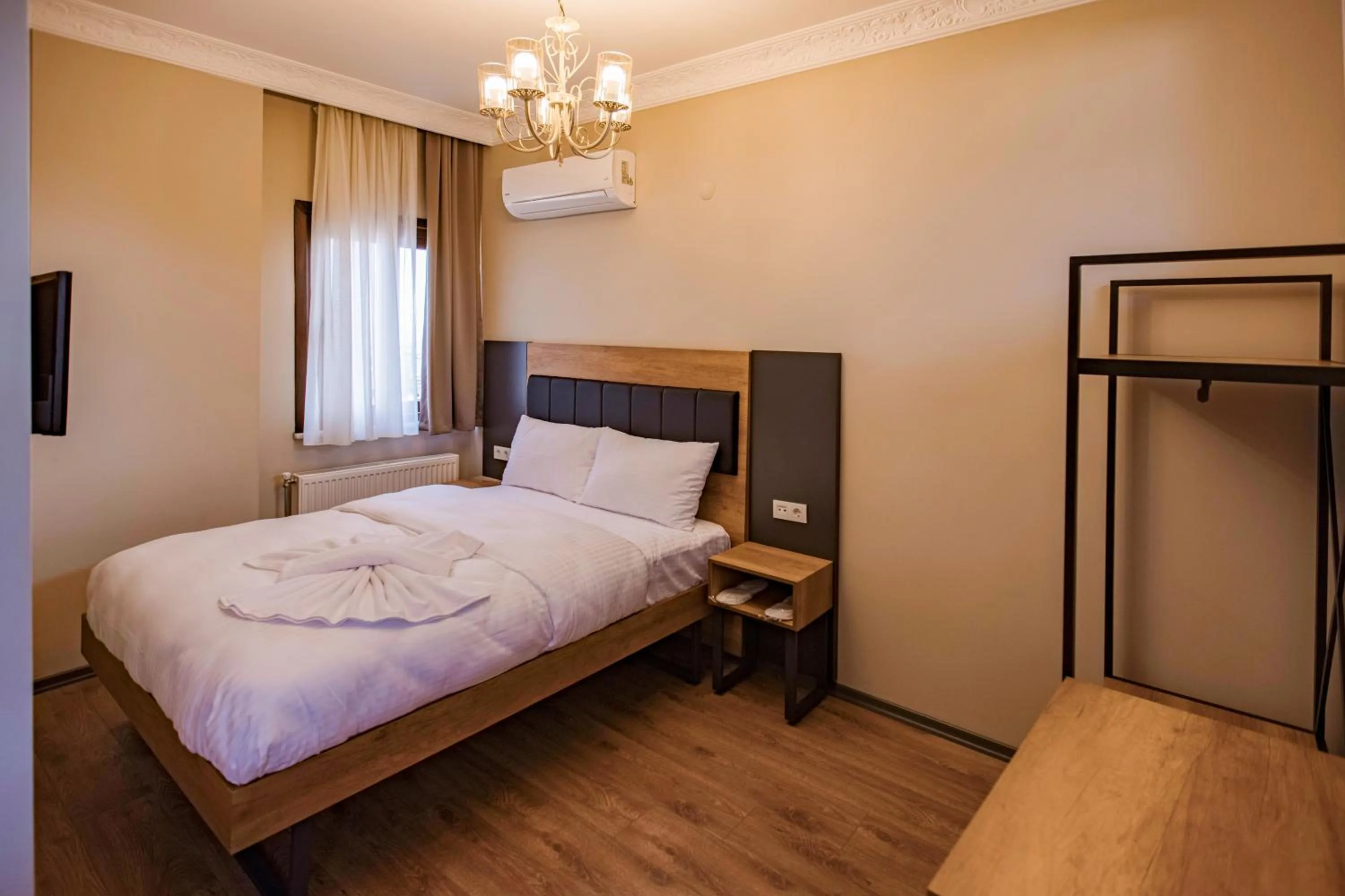 Bed in Grand Balyan Hotel & Restaurant